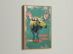 Artwork of a moose in a gold frame. The gold frame adds a touch of luxury and elegance. The artwork is matted and ready to hang. Enhance your home decor with a touch of glam. Create a focal point with framed artwork.