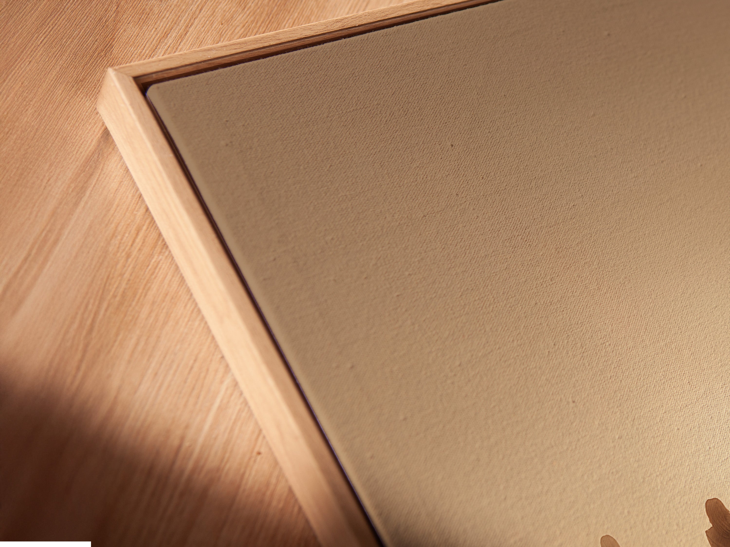 A canvas print in a floating frame is displayed. The artwork features people walking into the light. The floating frame gives the artwork a modern and sophisticated look. It is perfect for adding a touch of elegance to your home.