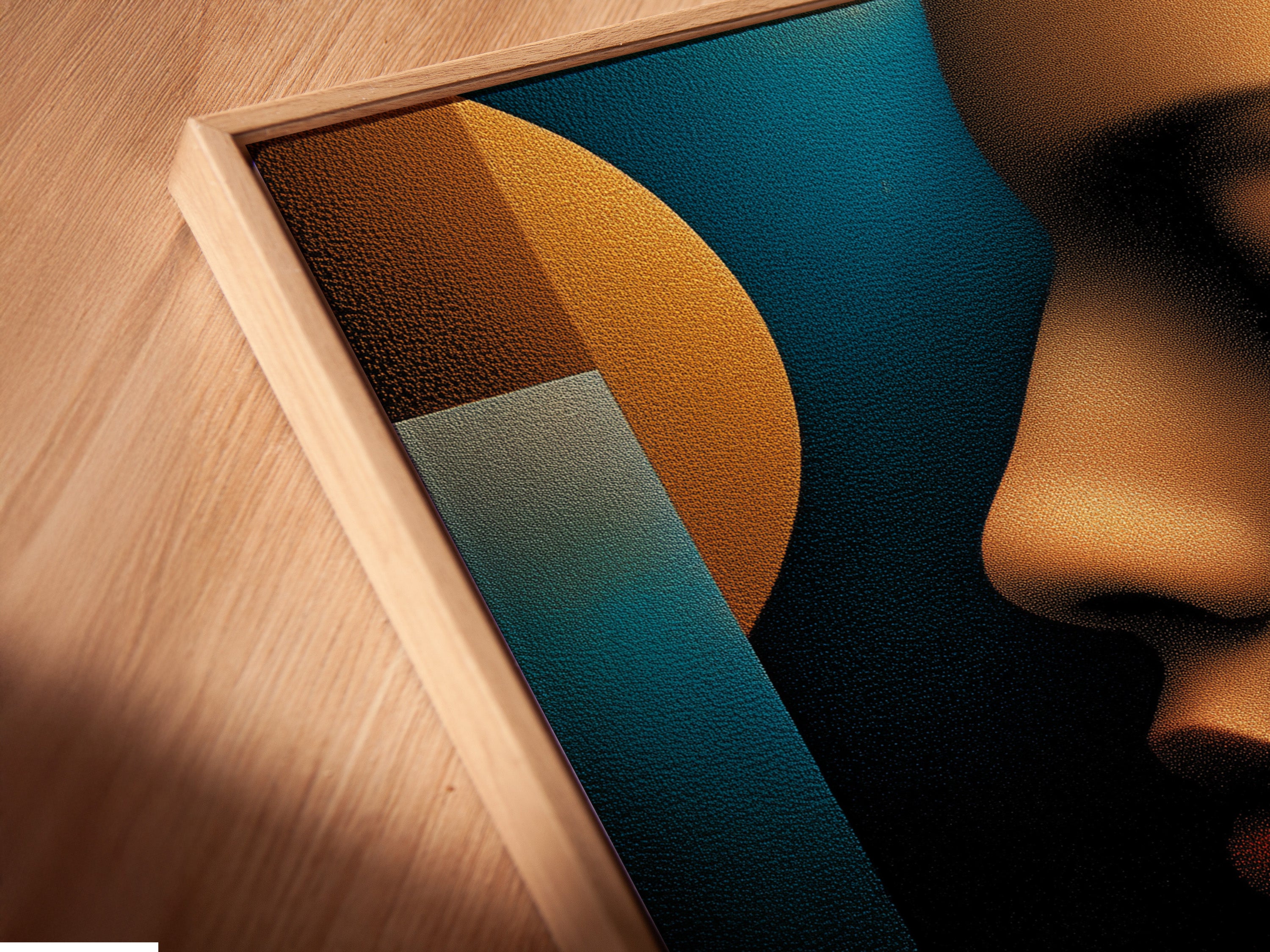 Angled close up of a canvas print in floating frame. The artwork features a woman's profile with geometric shapes. The canvas print adds texture and depth. The floating frame enhances the presentation. This is perfect for any art lover.