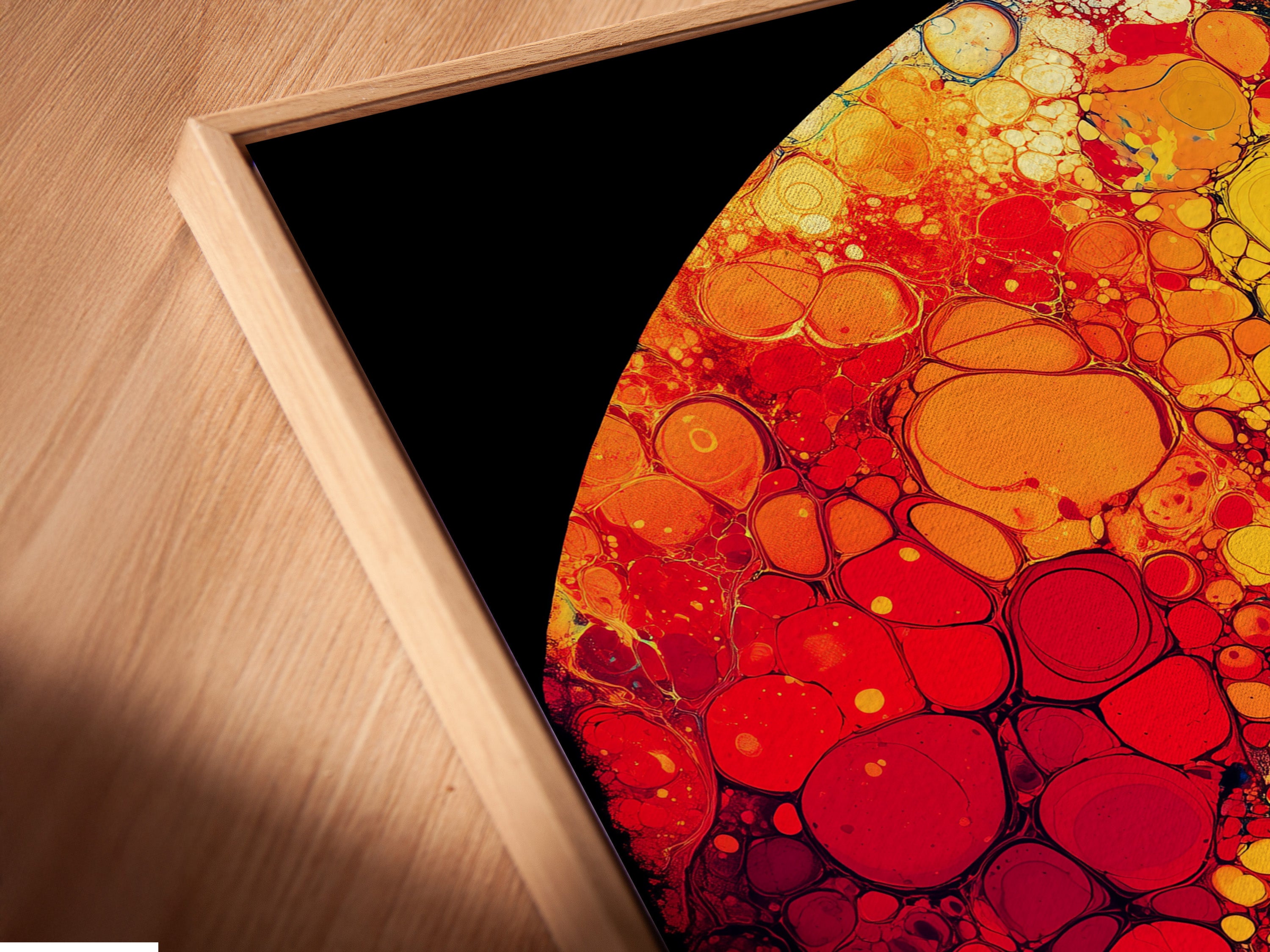 A close-up shows a canvas print in a floating frame. The frame creates a unique shadow gap. This framing style adds depth and dimension. Notice how the canvas seems to float within the frame giving it a modern touch.