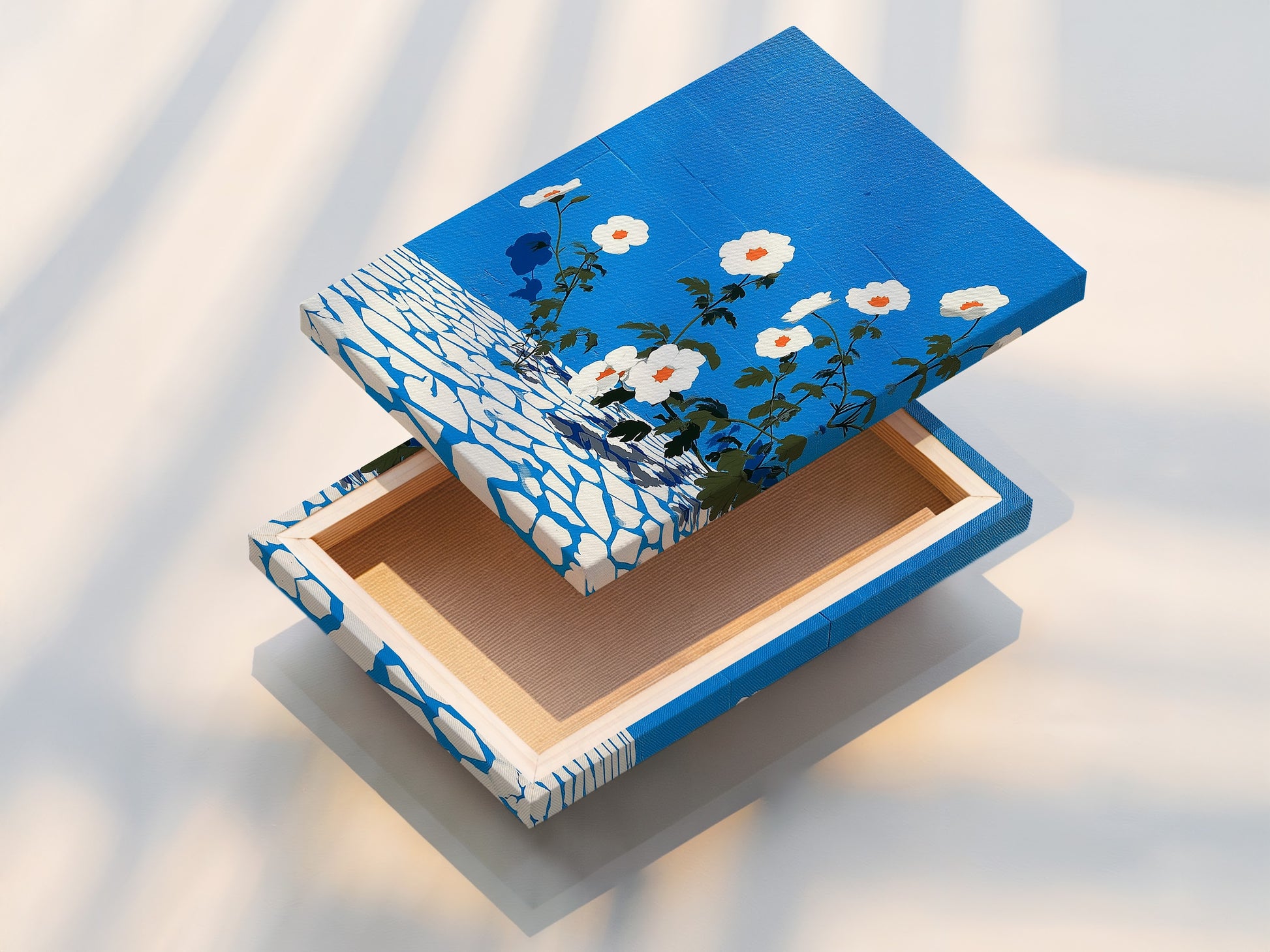 The image shows a stretched canvas print of floral artwork. The azure blue and botanical print create a modern look. This stretched canvas is ready to hang. Enhance your space with this flower artwork.