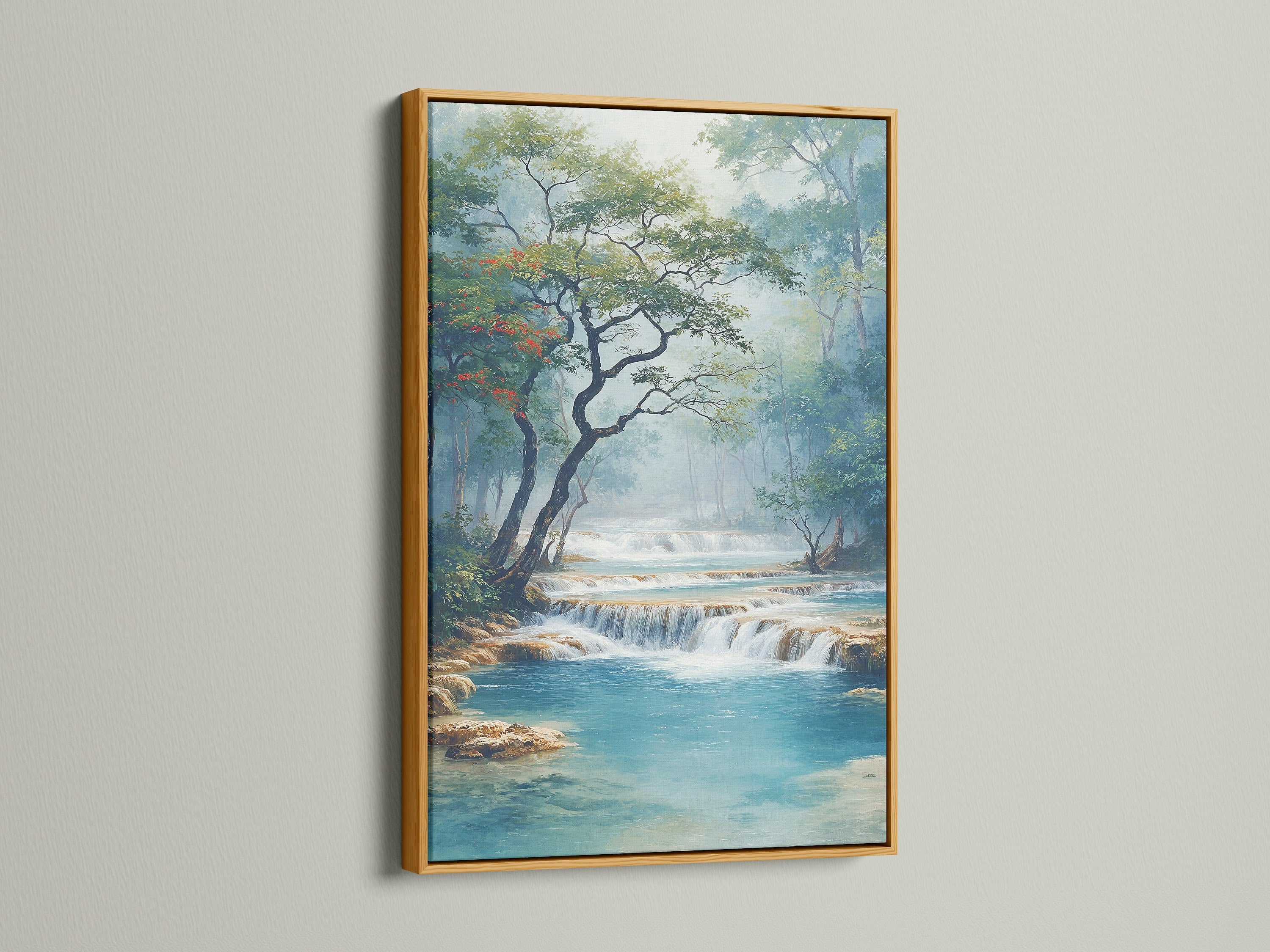 Waterfall Canvas artwork with a gold frame. This serene landscape poster brings nature's beauty indoors. Enjoy the calming water scenery with this fine art piece. The turquoise decor complements coastal and tropical styles.