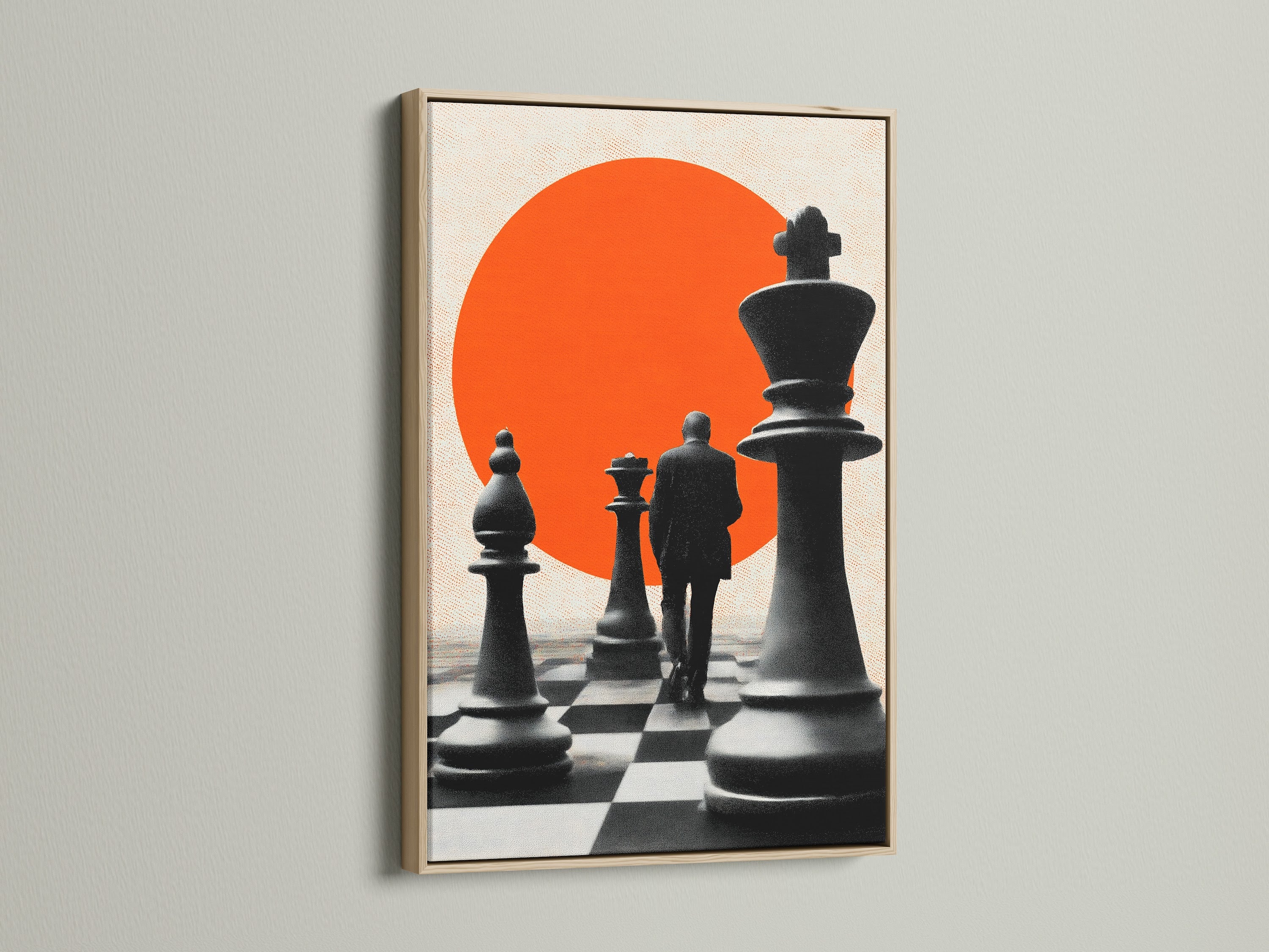 An oak Frame showcases a chess themed artwork. The art includes chess pieces and a person set against a bold red sun. This oak frame adds natural warmth to the artwork. It is perfect for any room.