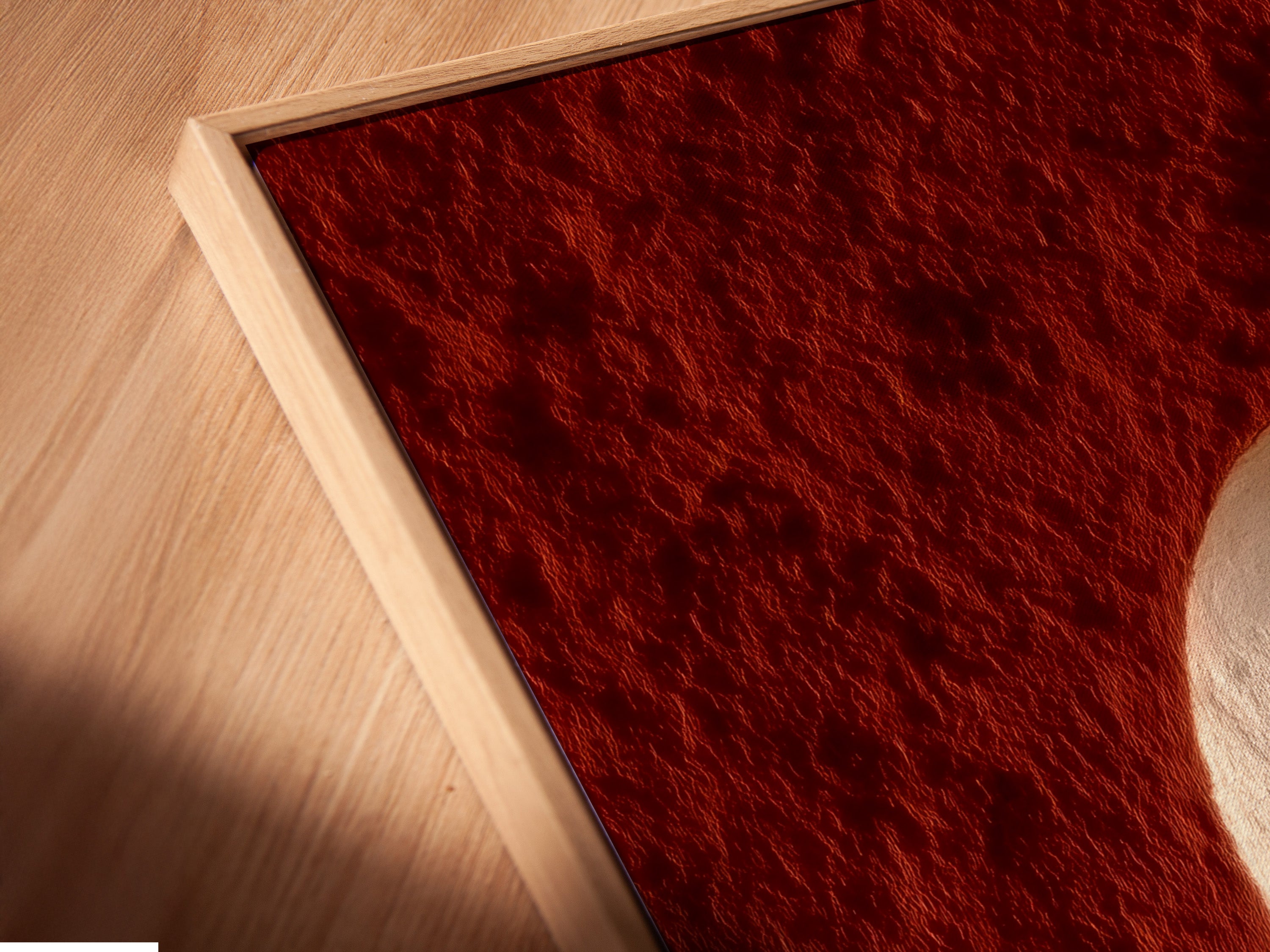 A close-up angled view of a canvas print in a floating frame. This showcases the artwork's depth and texture. Perfect for those appreciating fine details. This modern southwest decor adds sophistication. It is ideal for interior decorators.