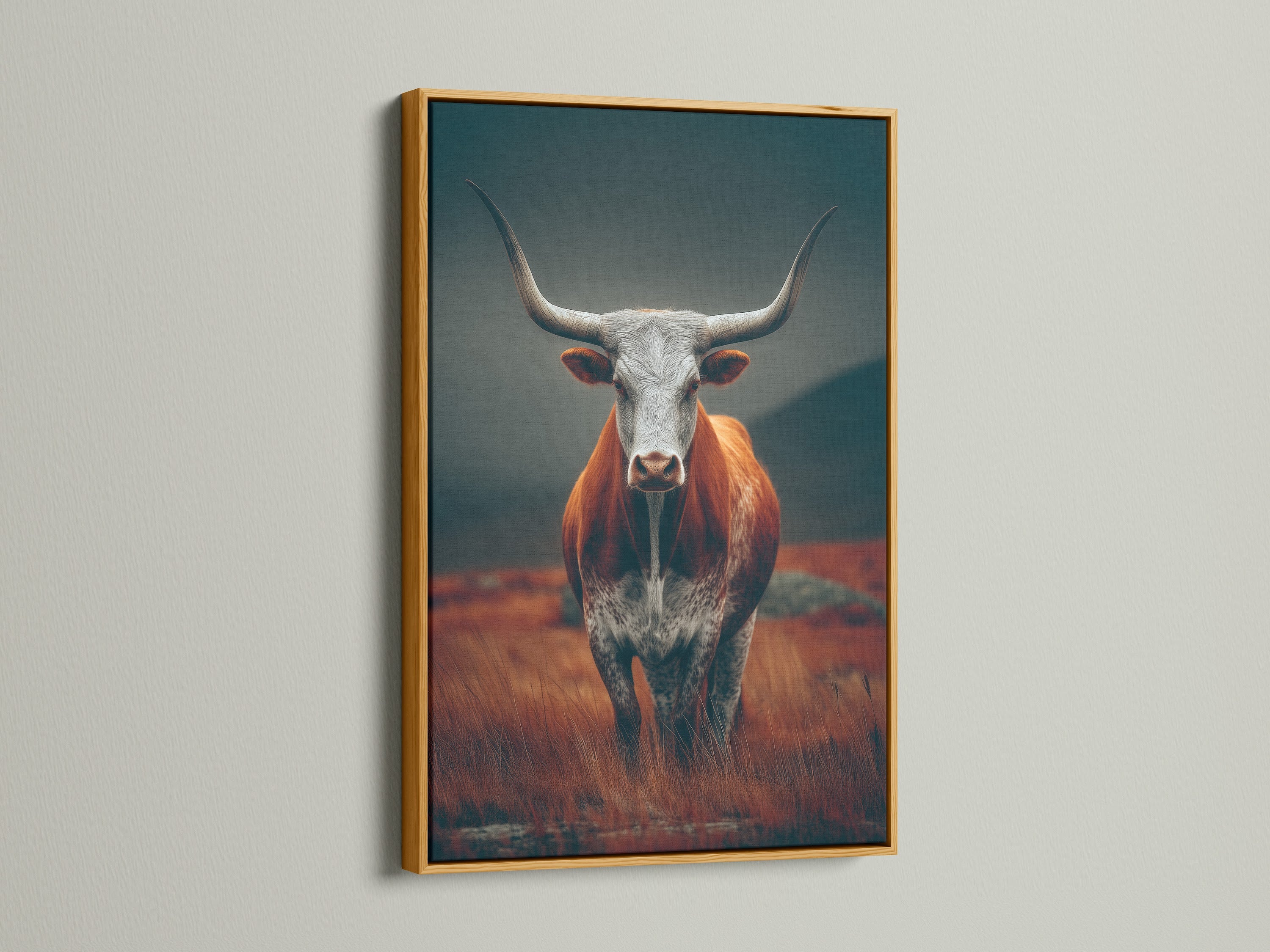 A gold frame adds a touch of elegance to this rustic Highland Cow artwork. The metallic finish complements the warm tones in the artwork. It creates a luxurious feel. This Scottish Cow print is perfect for adding a touch of glam to your farmhouse decor