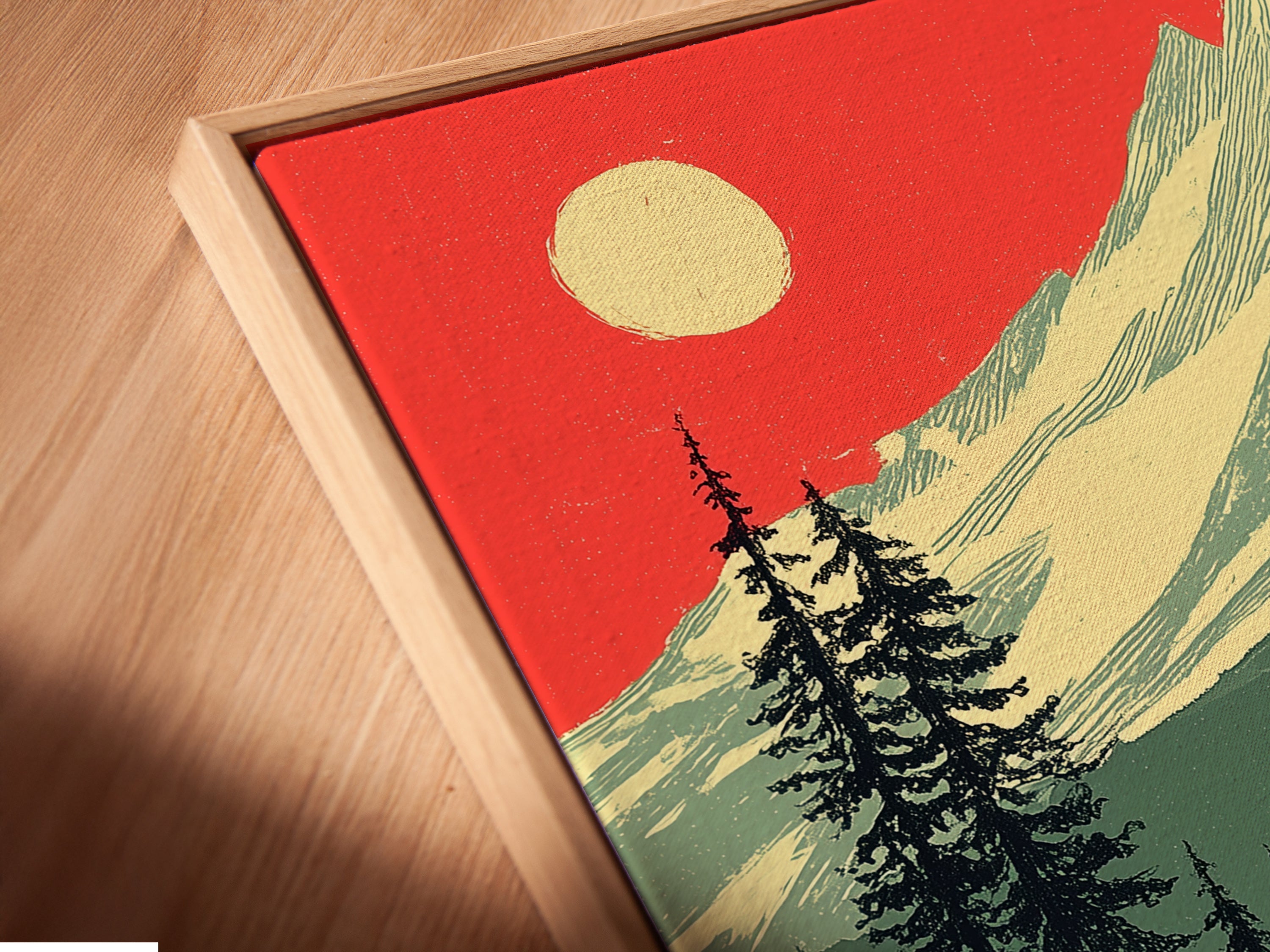 A close-up of a canvas print in a floating frame. This mountain lake artwork adds depth and dimension to the rustic scene. See the intricate details of the cabin and mountain artwork. The floating frame enhances the artwork's modern appeal. Ideal for any room.