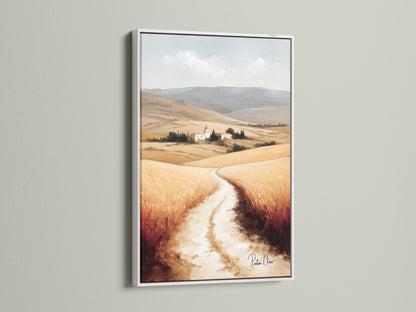 Tuscan Landscape artwork with a white frame. This countryside wall art complements any farmhouse decor. The neutral tone art highlights the Italian scenery. Featuring wheat field art this piece brings a touch of Europe to your walls. Perfect for creating a rustic ambiance.