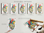 Available options are showcased: stretched canvas print fine art poster paper and floating frame. The anatomical heart artwork features colorful city houses. Select your preferred format for this medical art. Perfect for adding a unique contemporary piece to your decor.