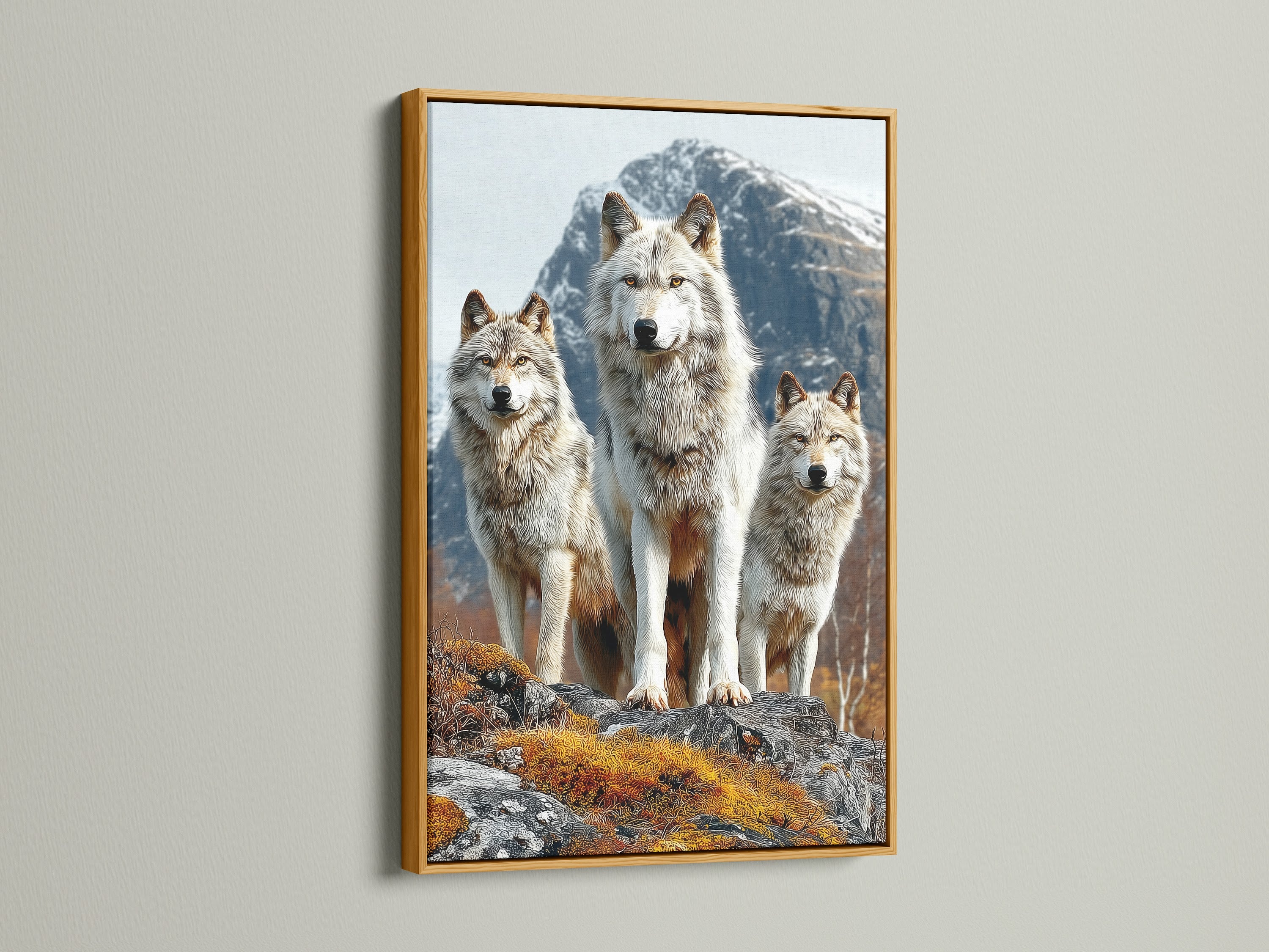 Wolf Pack artwork with a gold frame. The wildlife wall art radiates luxury. The mountain landscape is framed with elegance. This animal canvas adds a touch of opulence to rustic art and enhances the cabin decor.