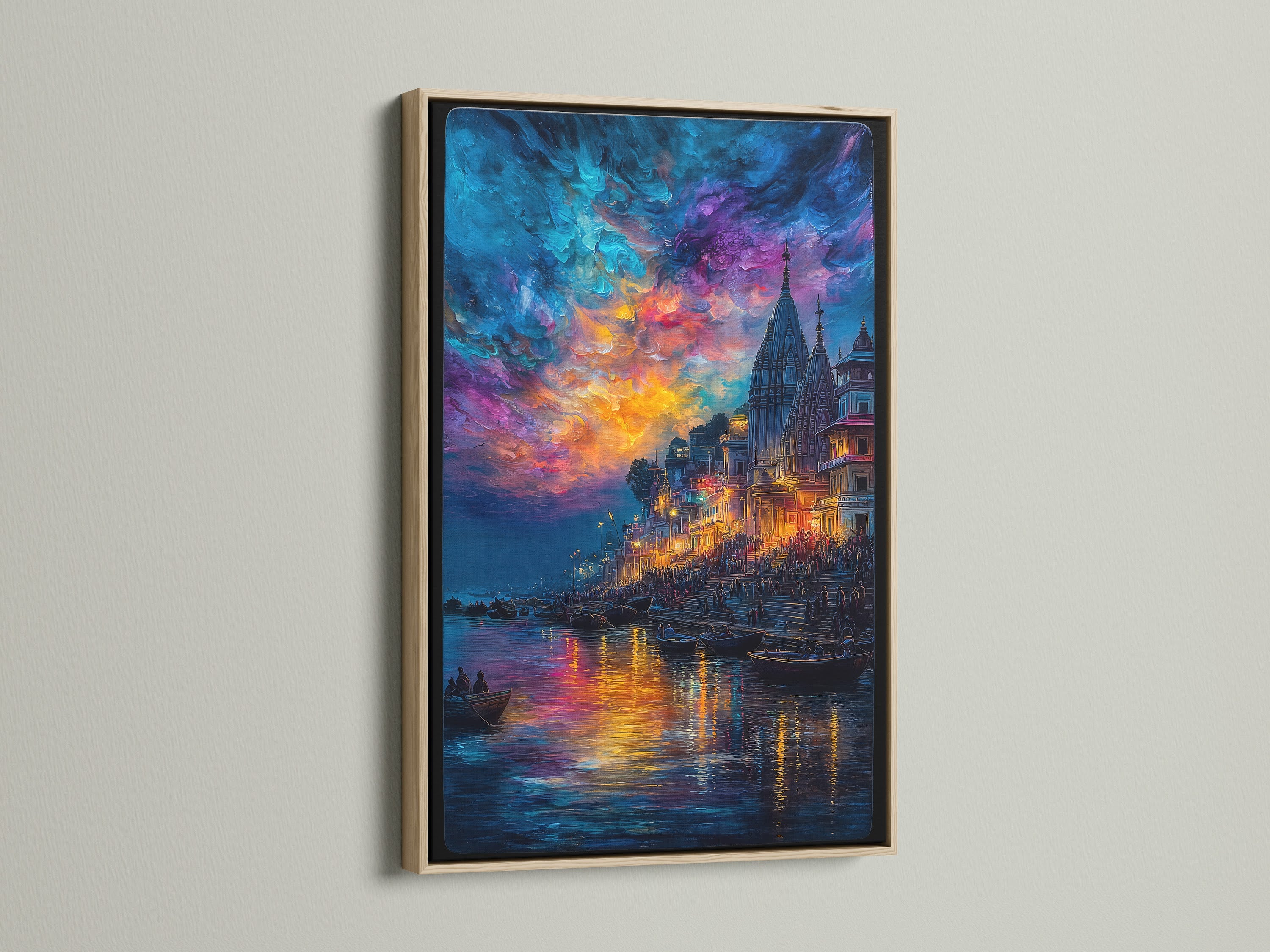Varanasi River Ghats canvas print in an oak frame. This Indian wall art showcases a Ganges River sunset. Ideal spiritual art for a yoga room. The vibrant colors and sacred art print create a serene atmosphere in any space.