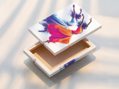 A stretched canvas print of the Indian Dancers artwork. This artwork is ready to hang. The canvas showcases the dynamic movement. The teal and orange hues create an eye-catching display.