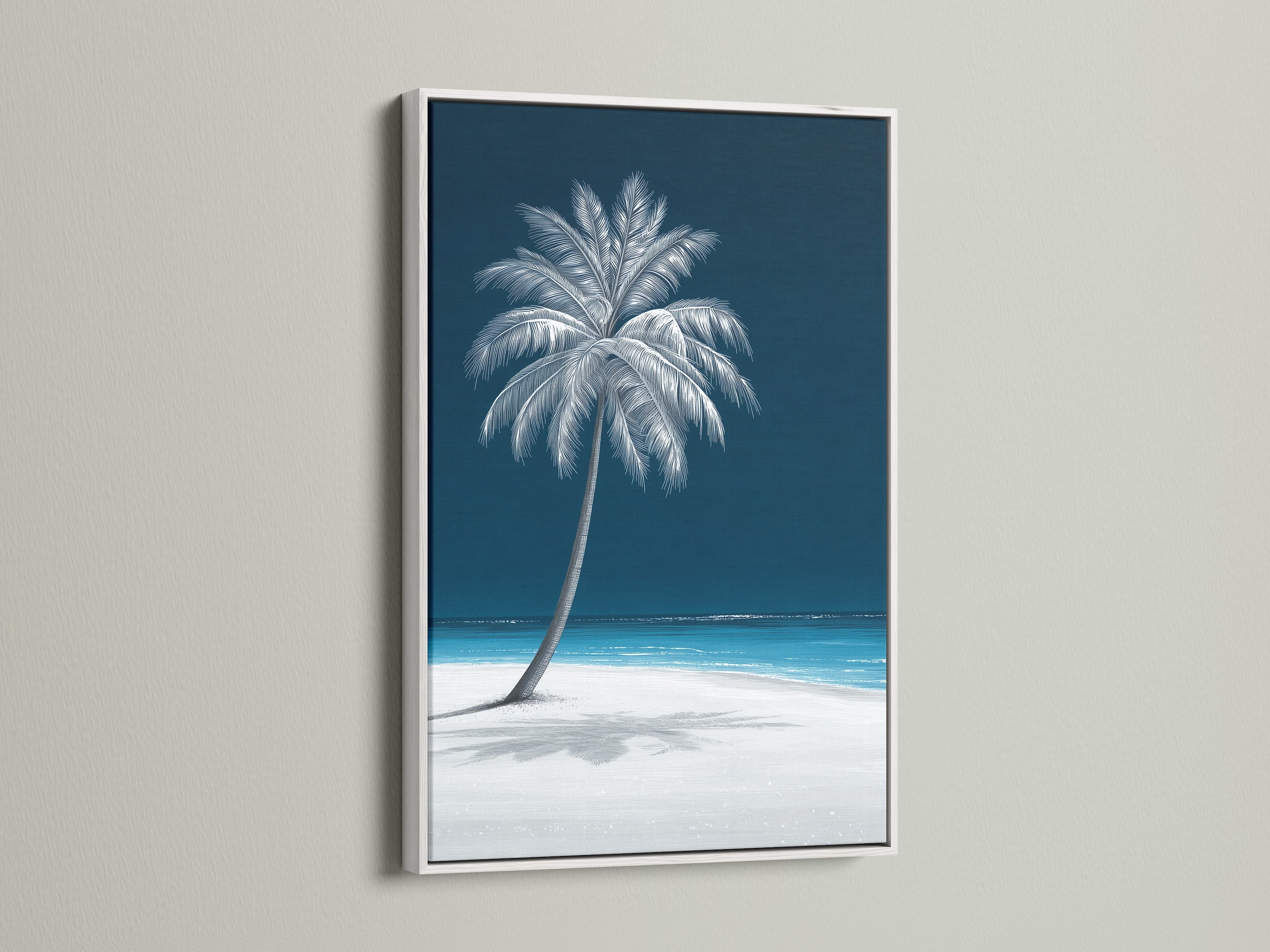 A white frame holds a tropical palm tree artwork. This navy blue beach canvas print brings a coastal vibe. This piece makes stunning ocean wall decor for any room in your home.