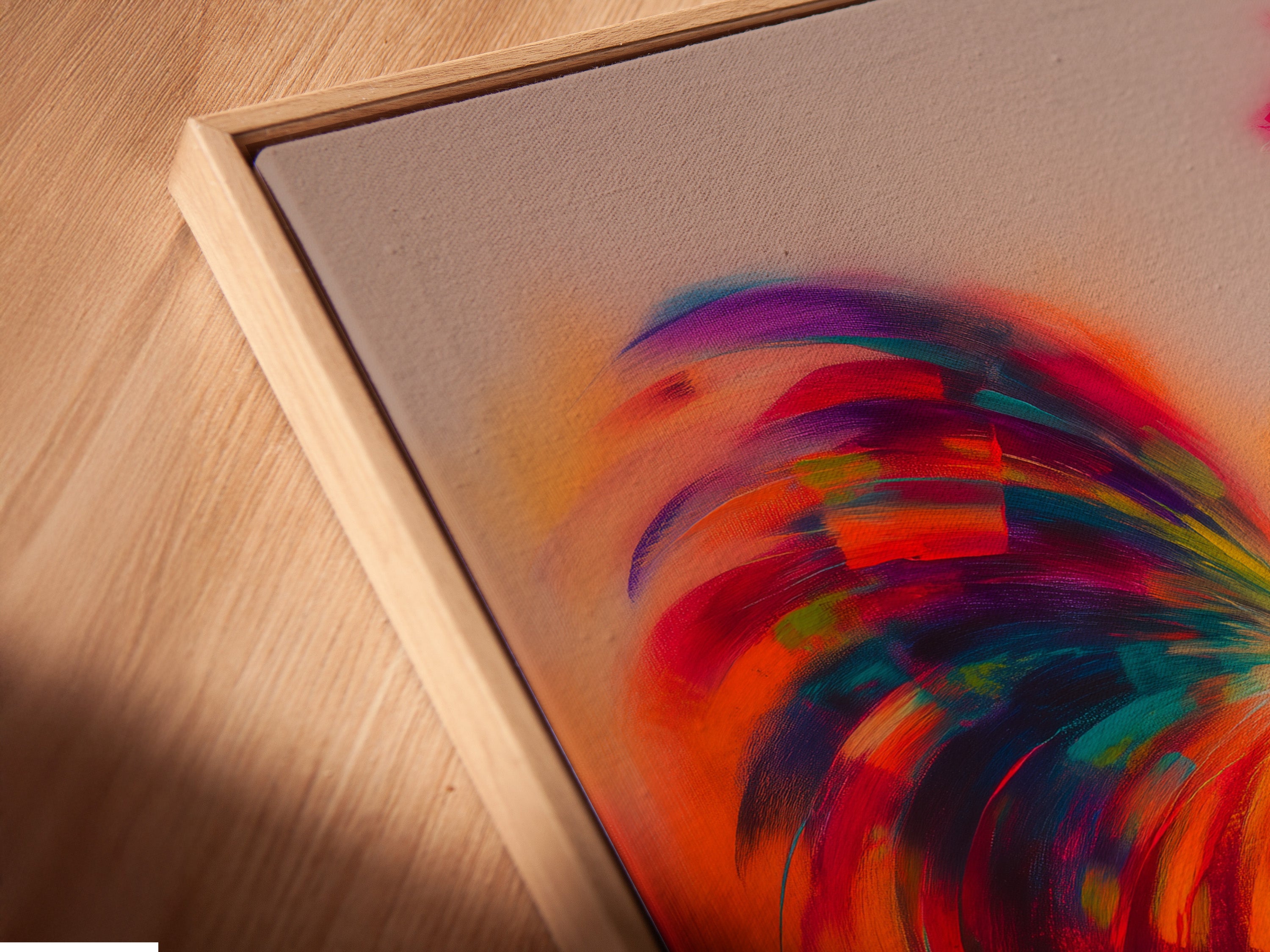 A close-up angled view reveals a canvas print in a floating frame. The colorful rooster artwork seems to float. This unique framing style adds depth. This is perfect for adding a modern touch to any room. Notice the fine details of the artwork and frame.