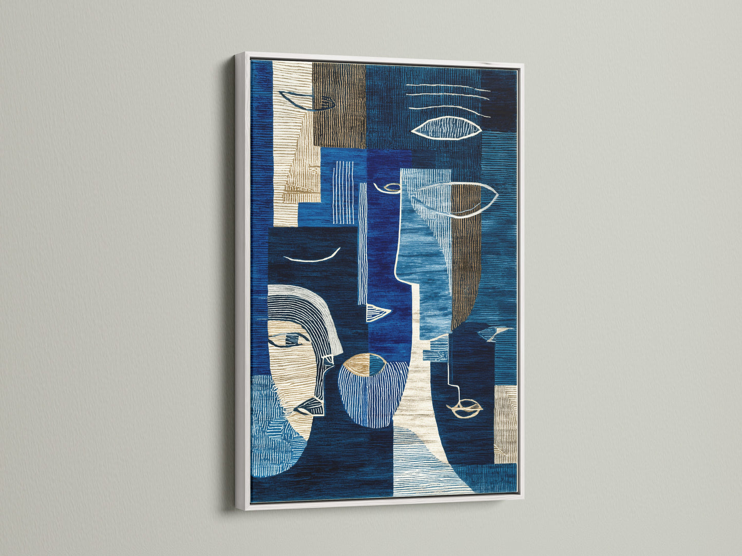 Modern geometric canvas wall art presented in a white frame. This abstract blue art print features contemporary navy and cream artwork. Perfect for adding a refined touch to bedroom wall decor or studio spaces. Explore this beautiful and stylish artwork