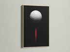Golf ball canvas art piece in an oak frame. This sports canvas art is a great addition to any room.  The black and red art creates a modern look. Ideal for golf enthusiasts.