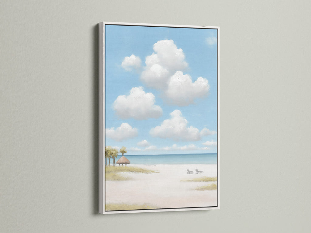 Here is a beach scene artwork in a white frame. Sky cloud art enhances your wall decor. Add serene artwork to your living space. This coastal painting is a great choice.