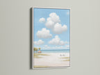 Here is a beach scene artwork in a white frame. Sky cloud art enhances your wall decor. Add serene artwork to your living space. This coastal painting is a great choice.