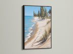 Coastal Beach House Artwork in a Black Frame. This artwork presents a stunning ocean view with a sandy shoreline. Offers a sophisticated touch to beach themed art. Suitable for traditional styles and vacation rentals.