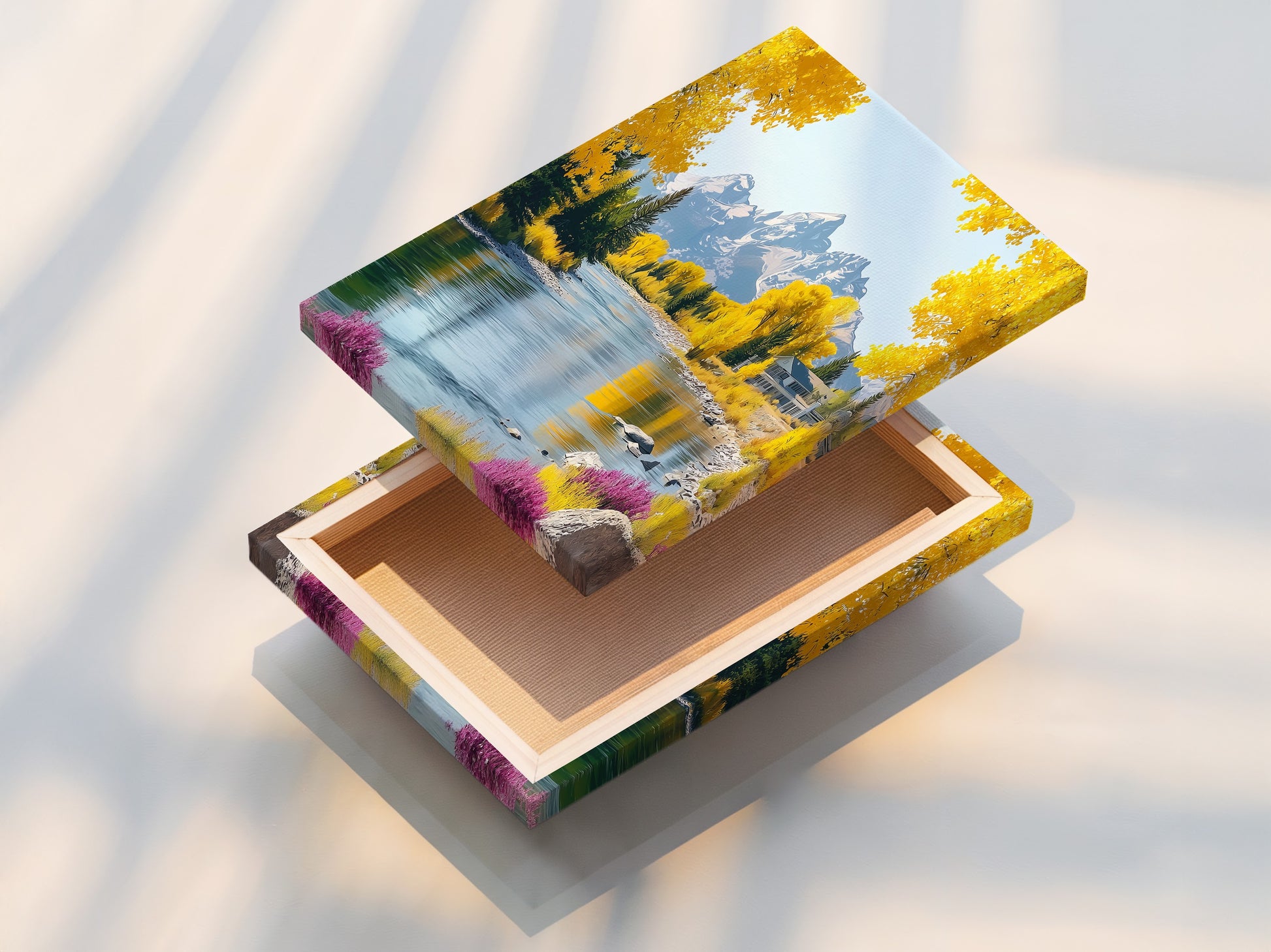 Here is a stretched canvas print of a mountain river scene. The autumn landscape features vibrant yellow trees. This artwork is ready to hang. It brings the beauty of nature into your living room bedroom or office space.