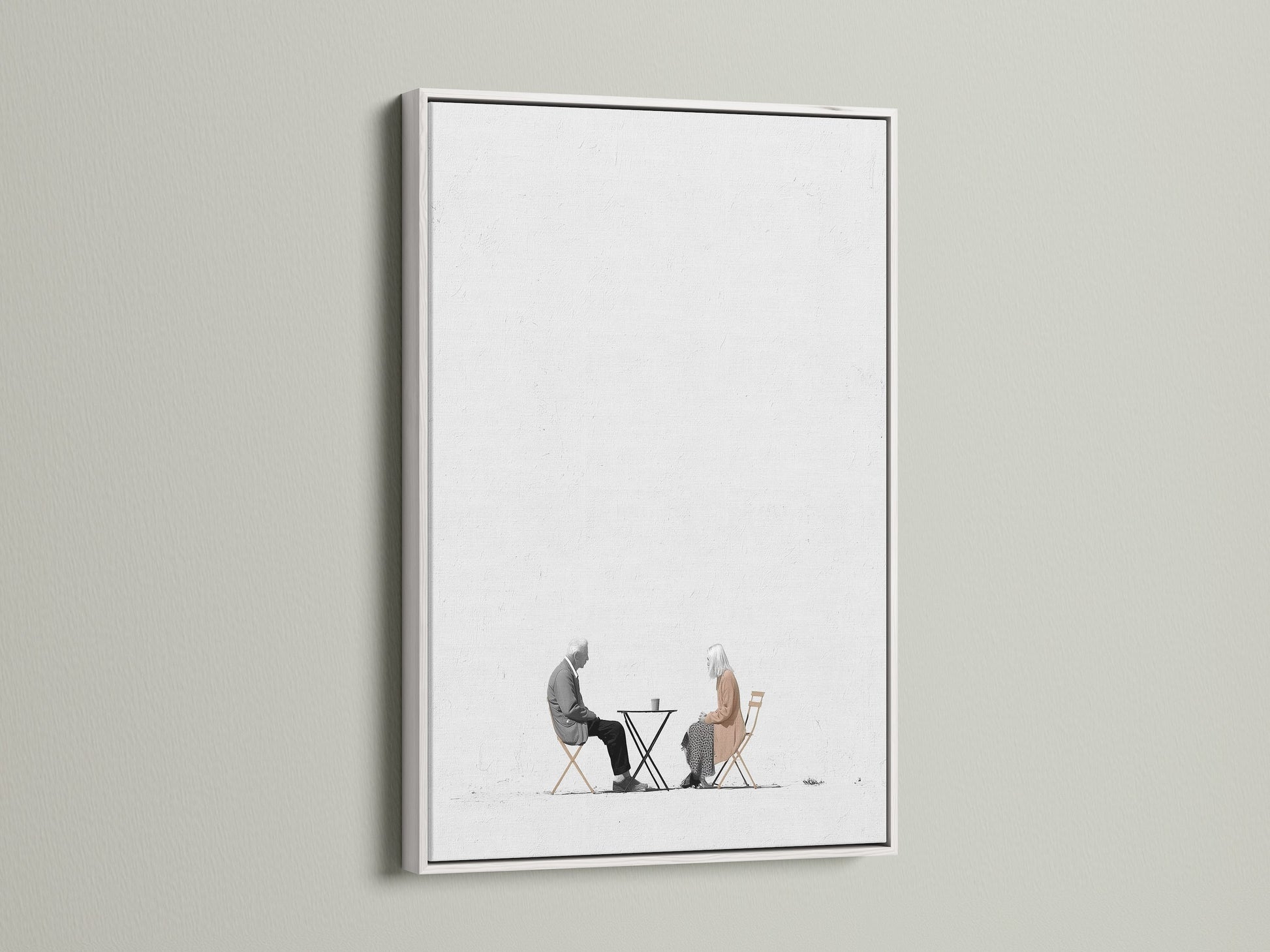 Enhance your decor with this minimalist art print. It features an elderly couple over coffee. The white frame provides a clean crisp look. Perfect for neutral wall art in any room. This simple art adds a touch of sophistication. Explore this modern art print today.