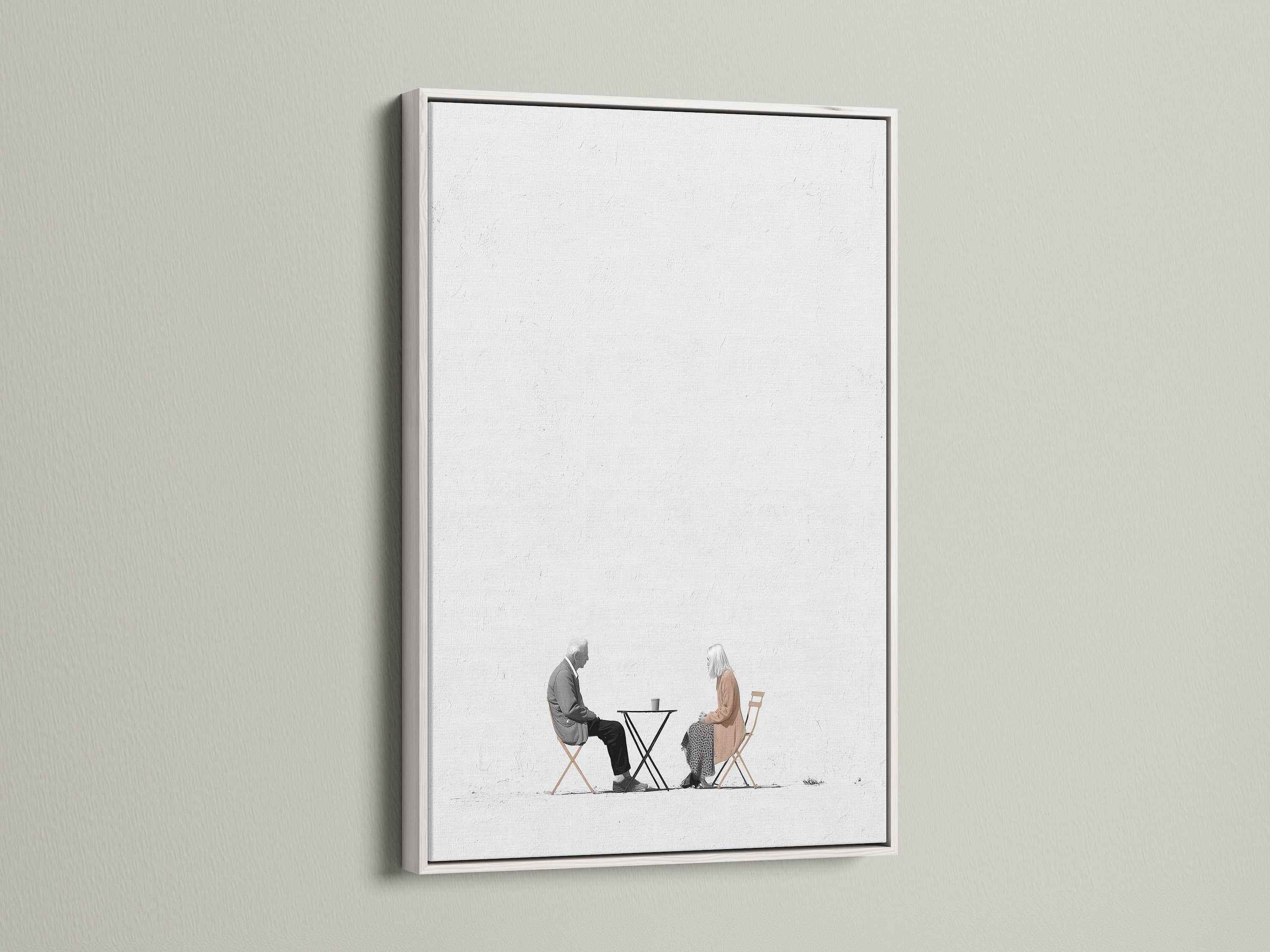 Enhance your decor with this minimalist art print. It features an elderly couple over coffee. The white frame provides a clean crisp look. Perfect for neutral wall art in any room. This simple art adds a touch of sophistication. Explore this modern art print today.