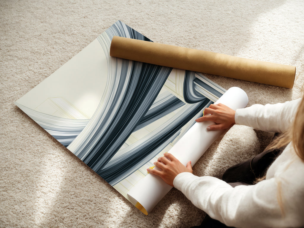 A woman carefully handles fine art poster paper. Ensuring quality and precision in every print. We create stunning abstract cityscape artwork on premium materials. Perfect for adding a touch of modern elegance to your space. Explore our range of options today.