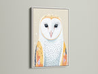 See the owl artwork showcased in a white frame. This modern art print suits a kids room decor. The clean white frame complements the scandinavian art style. A cute animal art piece for a boho nursery setting.