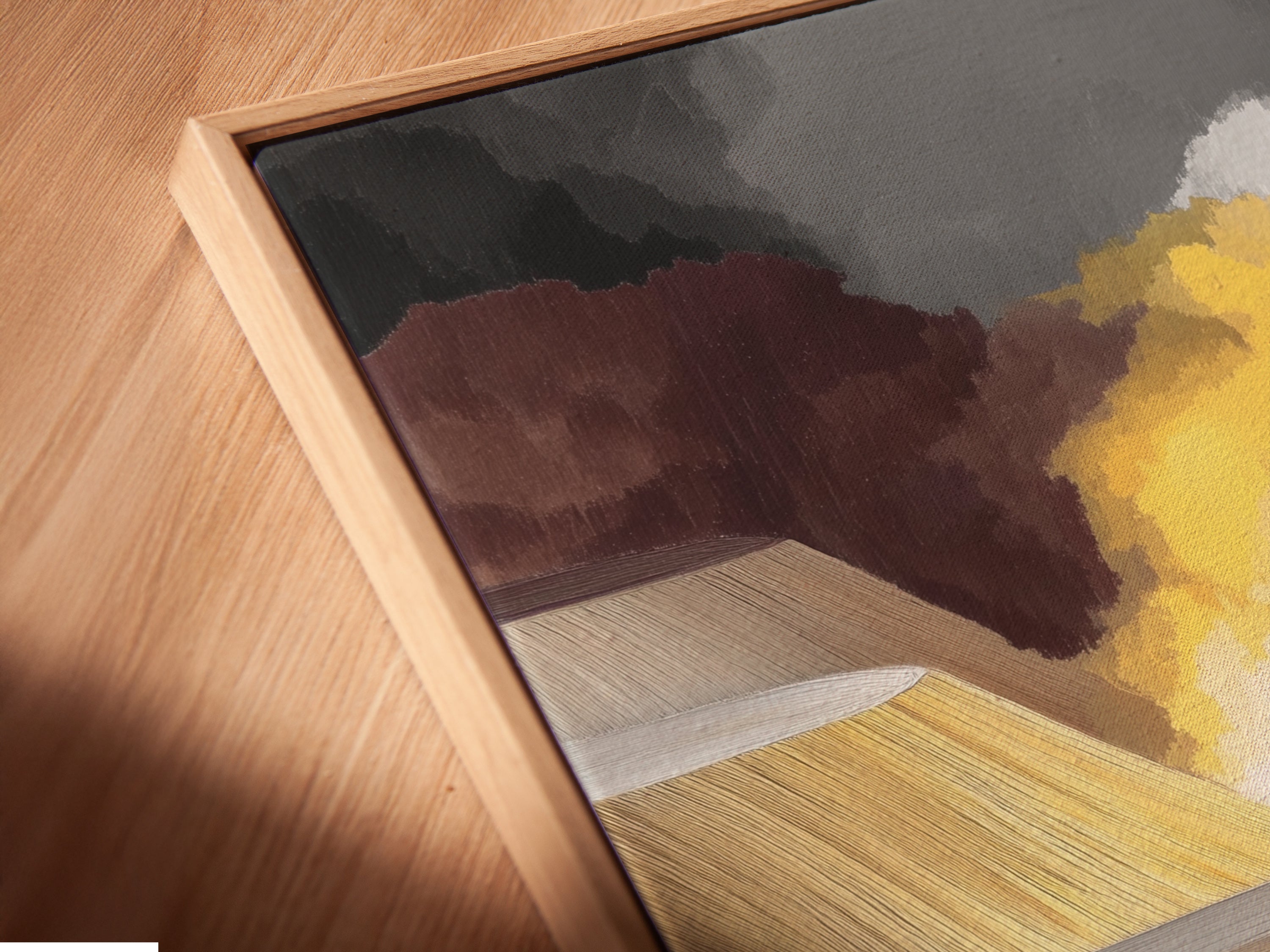 Angled close up of cyclists art in a floating frame. The canvas print highlights the abstract artwork. Add contemporary wall decor to your space. Perfect for modern prints and minimalist styles.