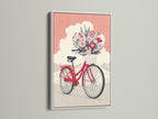Whimsical floral bike art print displayed in a white frame. The coral pink bicycle artwork is eye-catching. A botanical poster enhances bedroom decor. This vintage bike print adds a retro touch. A great piece for eclectic or cottagecore interiors.