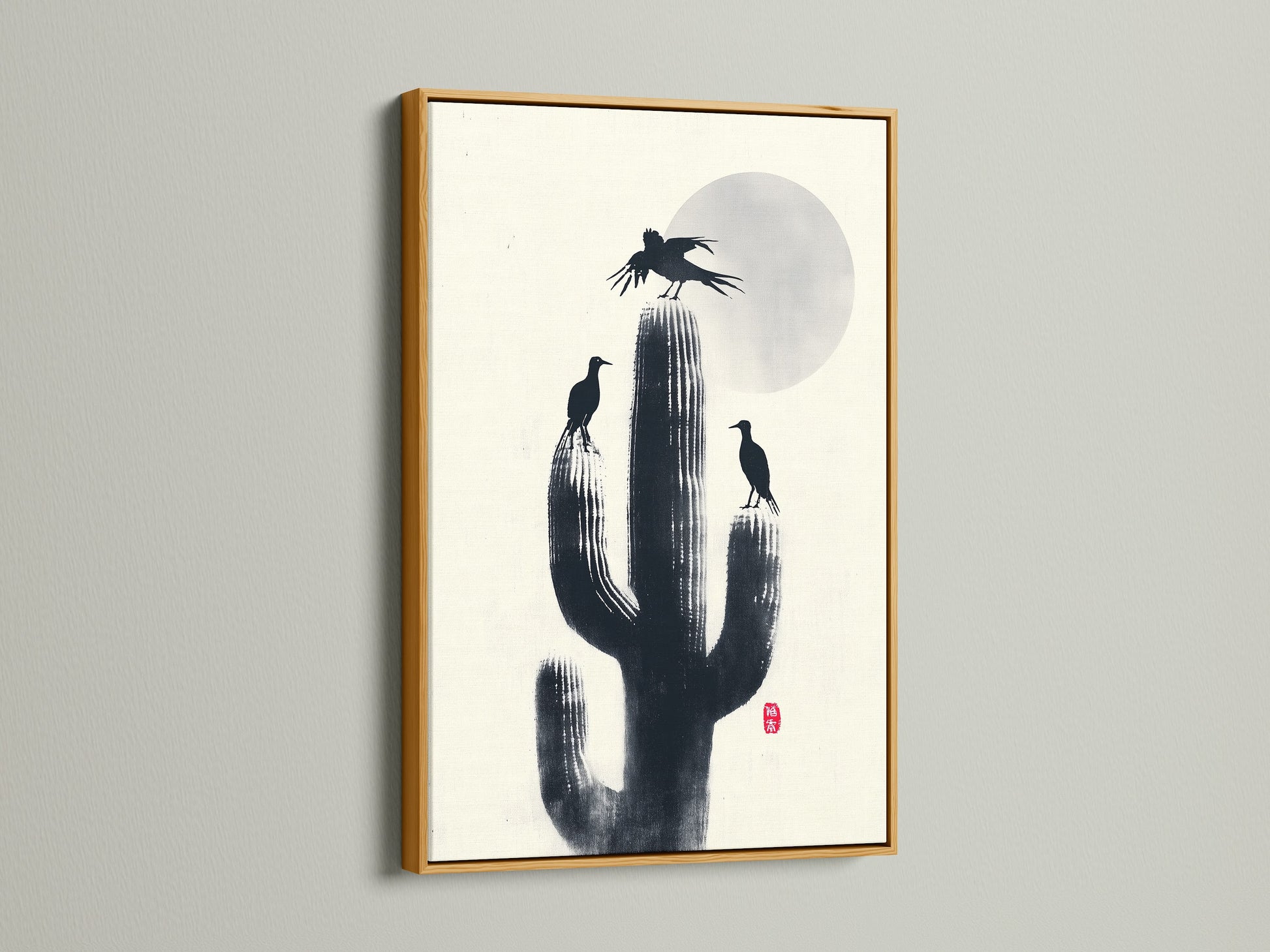 Cactus Birds desert print in a gold frame. Add a touch of southwestern style to your study room. The nature canvas features black birds on a cactus. A minimalist monochrome artwork perfect for any wall.