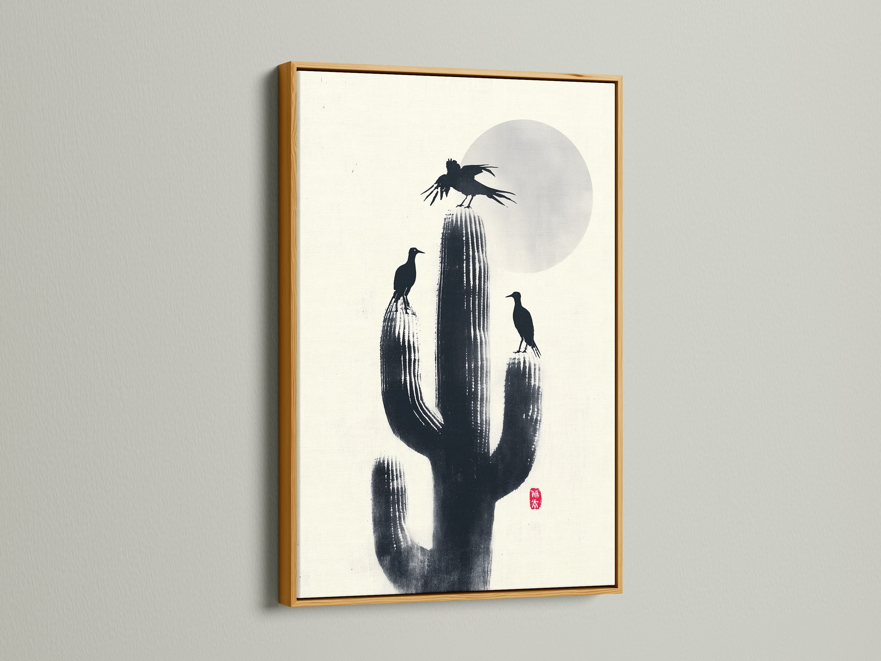 Cactus Birds desert print in a gold frame. Add a touch of southwestern style to your study room. The nature canvas features black birds on a cactus. A minimalist monochrome artwork perfect for any wall.