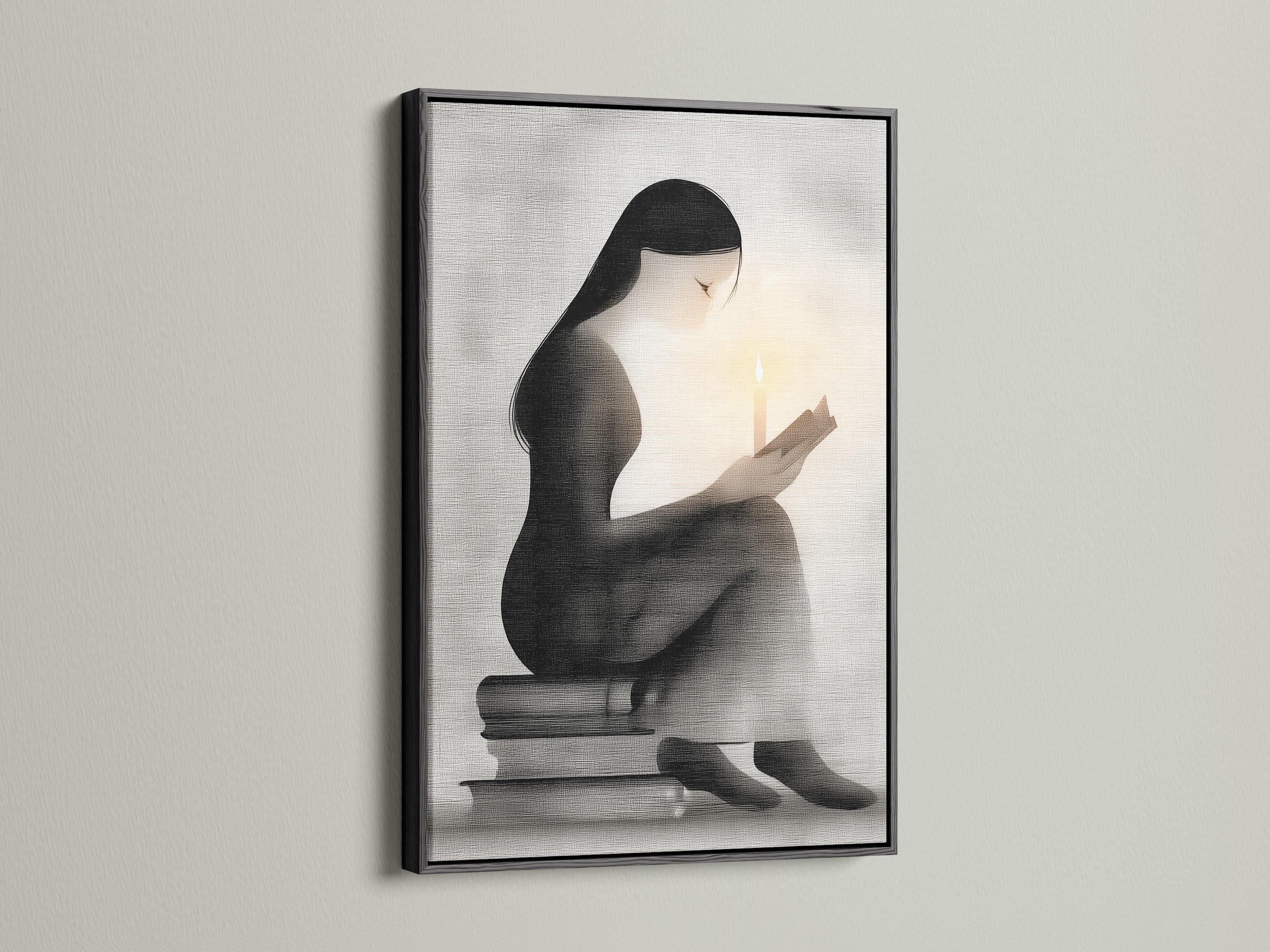 Minimalist woman reading print in a black frame. The artwork features a candlelight scene. This reader artwork is ideal for library art. Enhance your home office with this grayscale print.