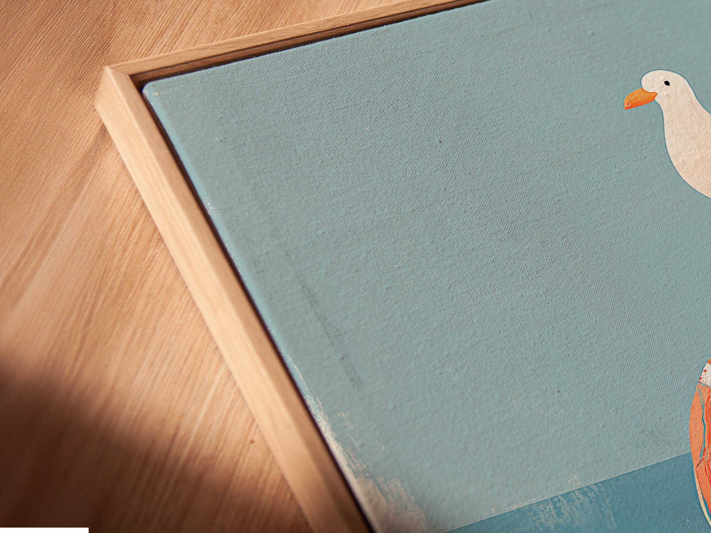 Close-up of artwork in a floating frame. The canvas print shows great detail. The floating frame adds depth. This unique frame style elevates the artwork. Ready to hang and enjoy.