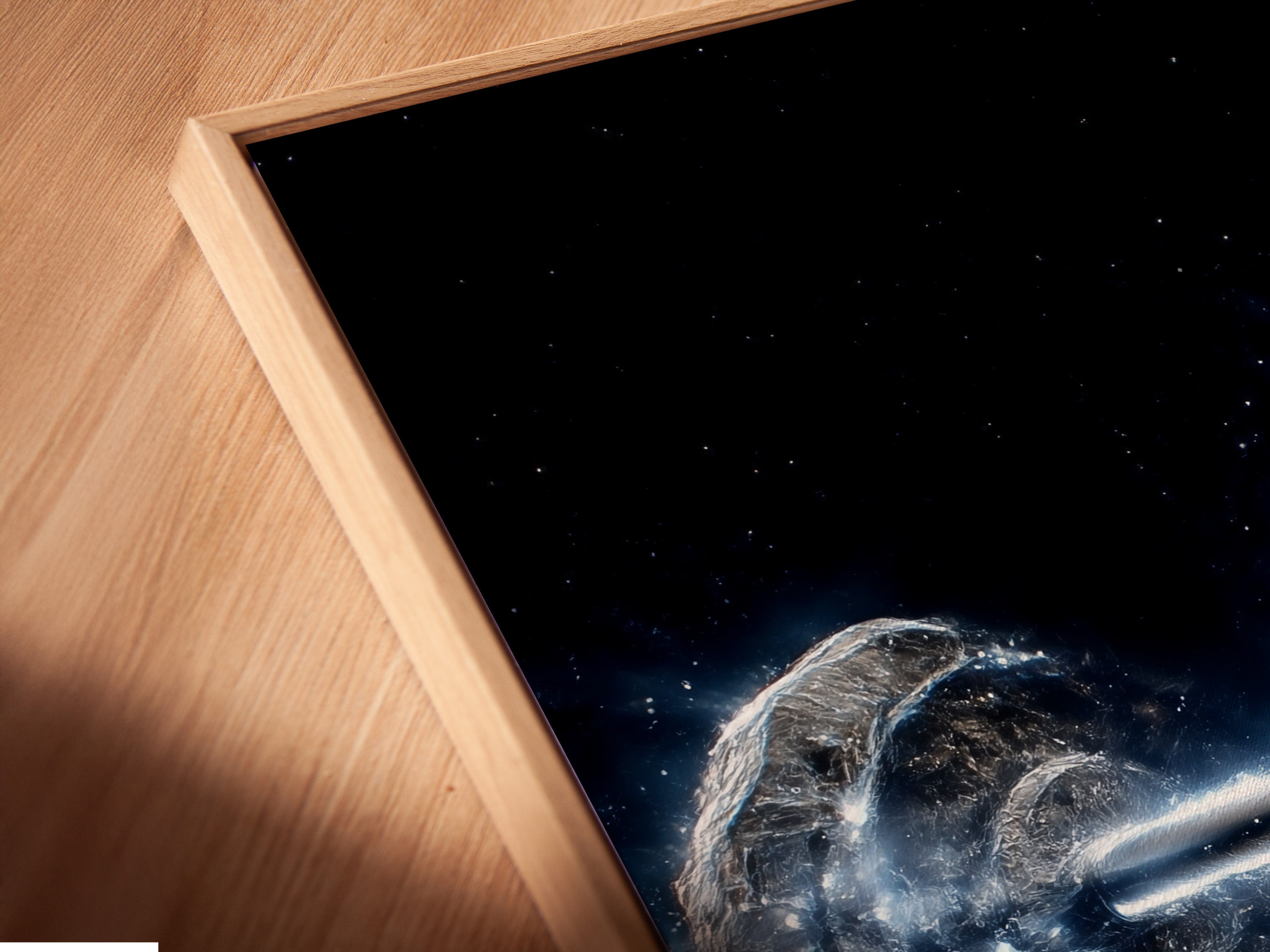 Angled close up of a Cosmic Collision canvas print in a floating frame. This unique frame enhances the modern space wall art. Perfect for contemporary interiors studios or clinics. Add sophistication to your space with this framed art.