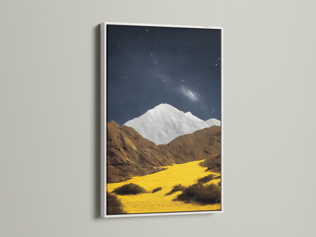 A Mountain Galaxy canvas artwork stands out with a white frame. This celestial canvas features a galaxy wall art print. The earth tones and mountain decor make it perfect for study rooms. It's a modern art piece that enhances any space. The artwork is a blend of nature and modern style.