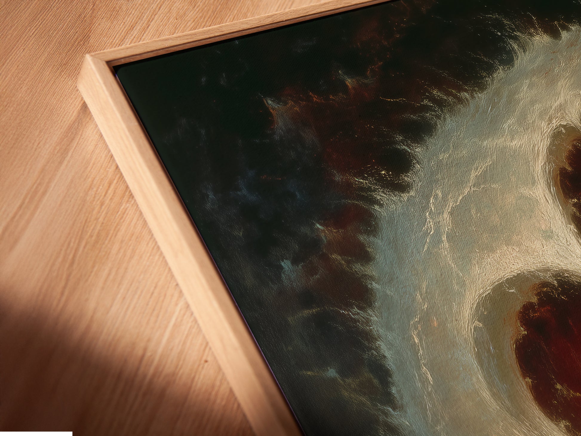A close-up angled view of the Celestial Vortex canvas print in a floating frame. The abstract galaxy wall art is perfect for library wall art. The moody tones make a unique focal point. It is a great gift for students.