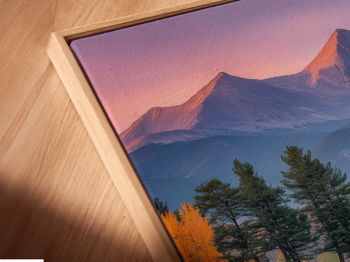 A close-up angled view of a canvas print in a floating frame. The mountain lake artwork features a pastel sky. The landscape print provides a serene view. The floating frame adds a modern touch. It's ideal for lodge and cabin styles.