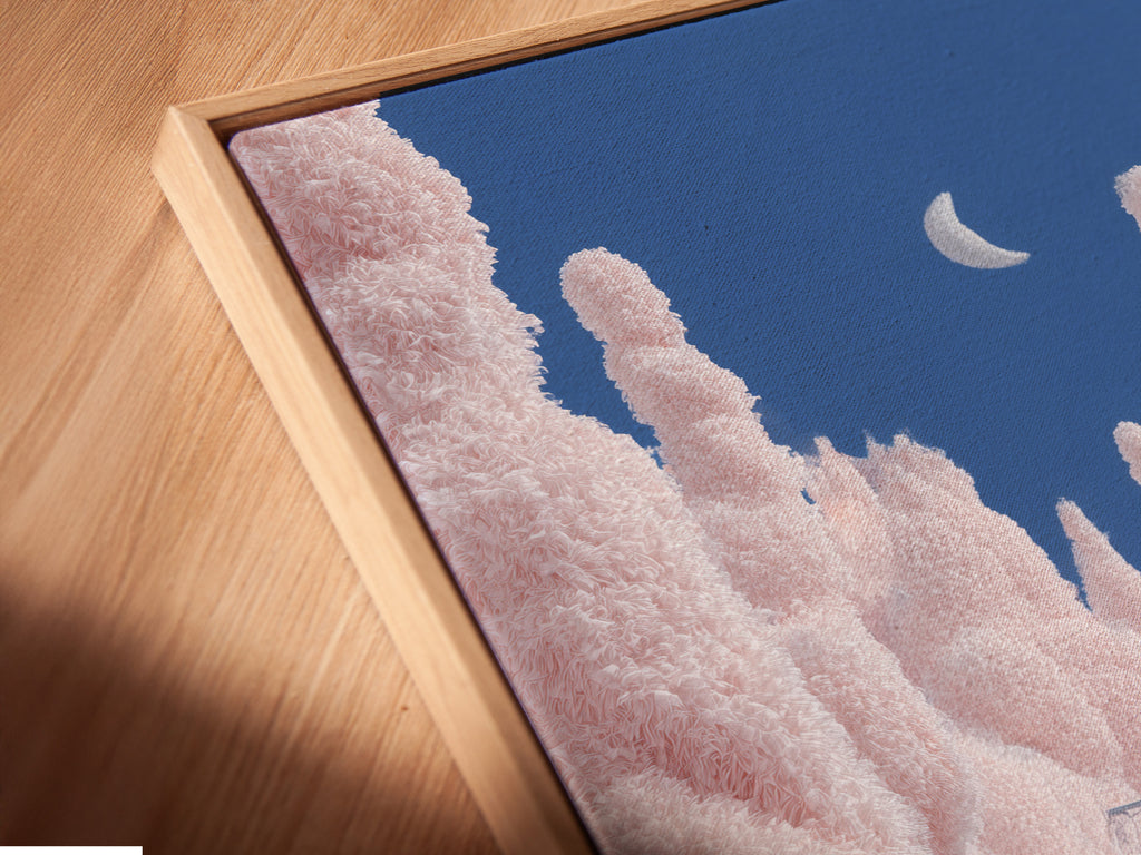 A close-up angled view reveals a canvas print. It is set in a stylish floating frame. The floating frame gives the artwork a contemporary edge. It makes the pink snow forest print stand out. This adds depth and dimension to the piece.