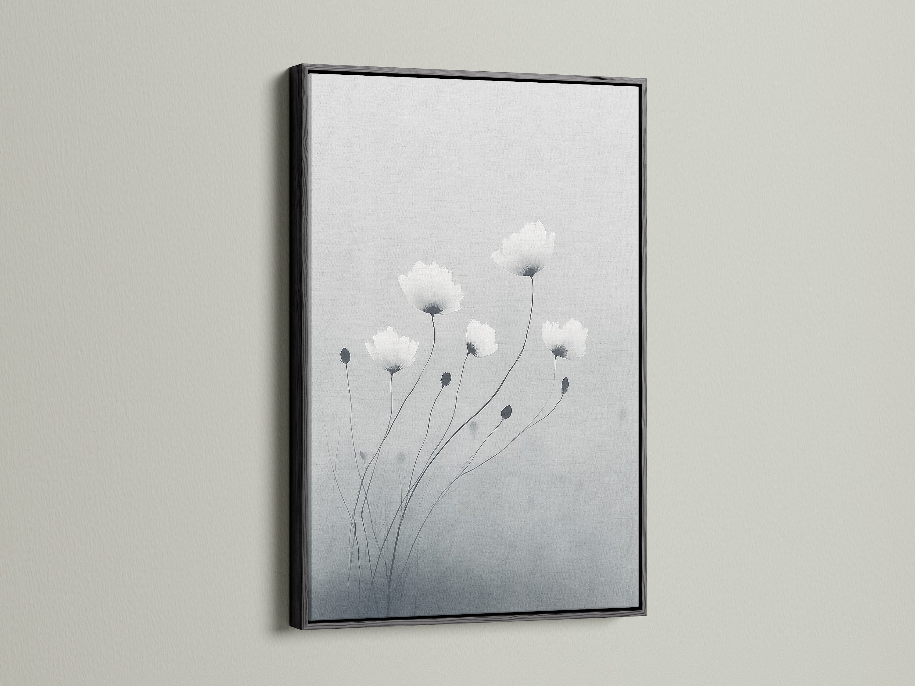 Enhance your decor with minimalist flower artwork in a black frame. The gray and white botanical wall art stands out beautifully. This modern canvas art is ideal for adding sophistication to your space. Black frames add a bold touch to neutral art pieces.
