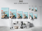 This image shows a size comparison chart in an interior setting. It helps visualize how different sizes of coastal seascape artwork fit in a room. The chart includes stretched canvas prints and framed options. This is ideal for planning your minimalist decor with serene artwork.