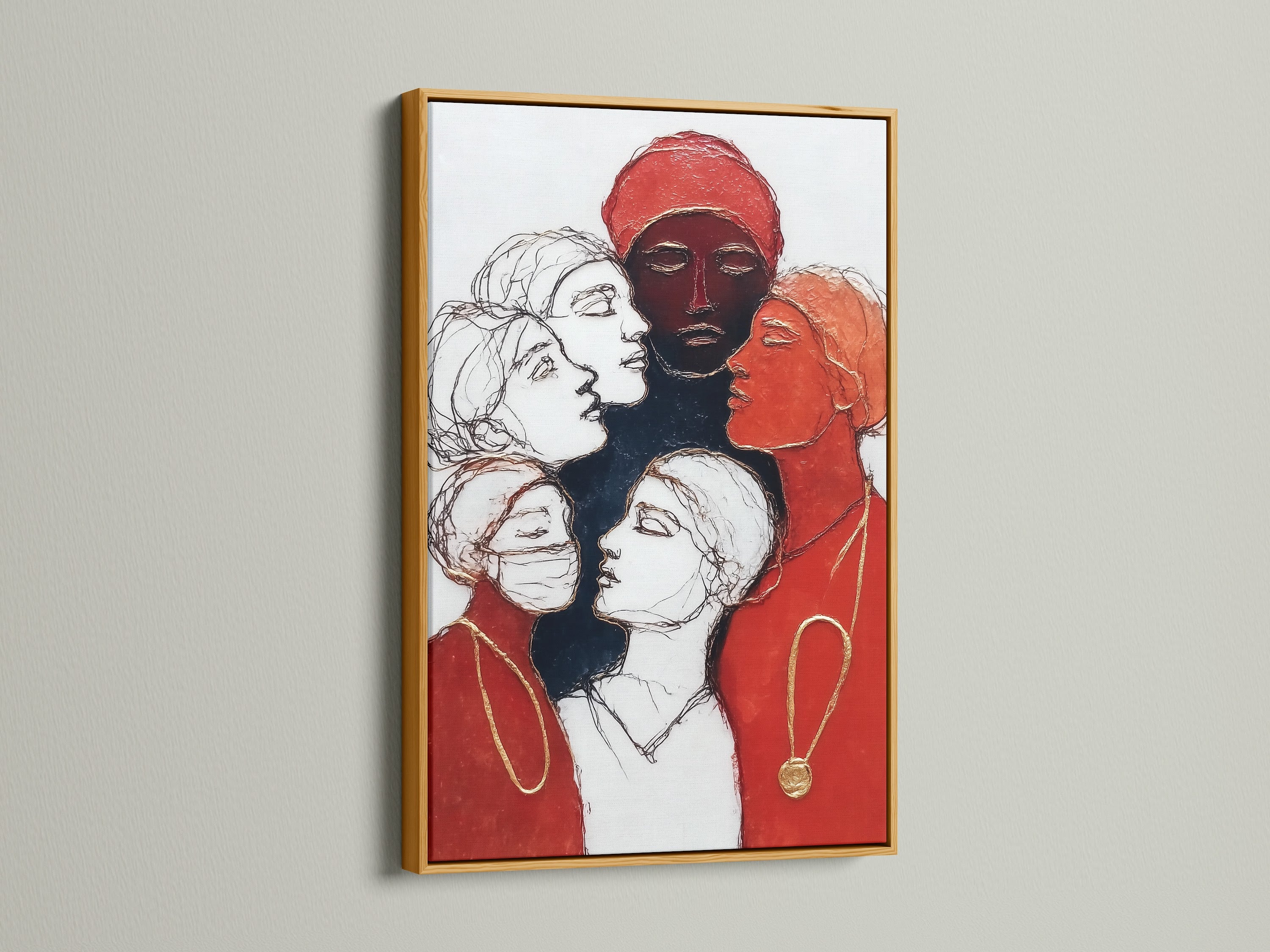 A gold frame highlights women empowerment art. The canvas print features diverse female portraits in red and black contemporary colors. This inspiring wall art adds a touch of elegance. Perfect for creative agencies and studios. Ideal for modern decor.