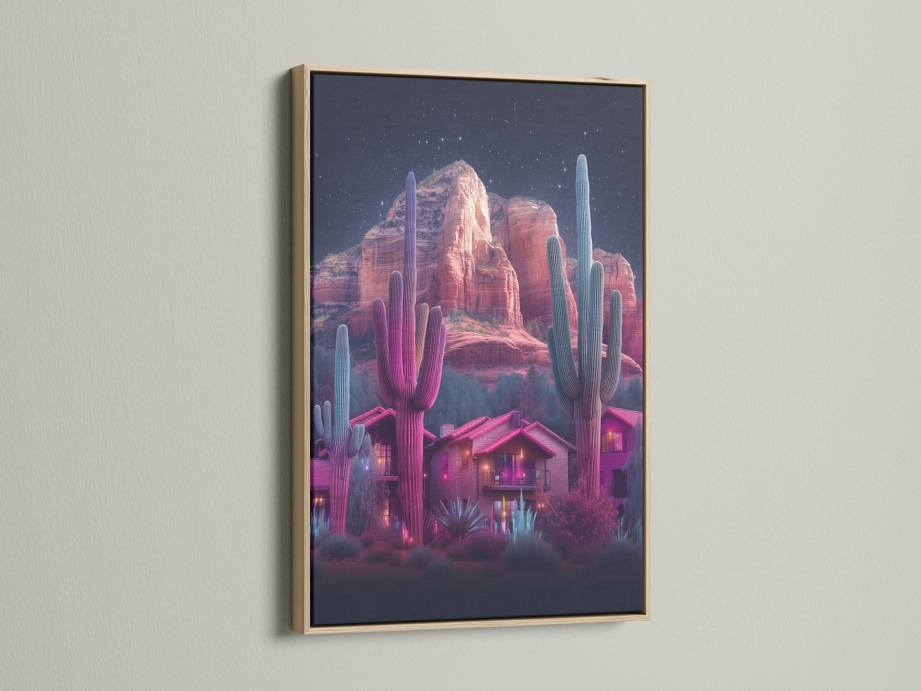 Neon cactus artwork featuring a desert landscape inside an oak frame. The artwork showcases a southwestern scene with vibrant pink and teal hues. This cactus print brings desert vibes to your space. Perfect for southwestern decor and modern homes.
