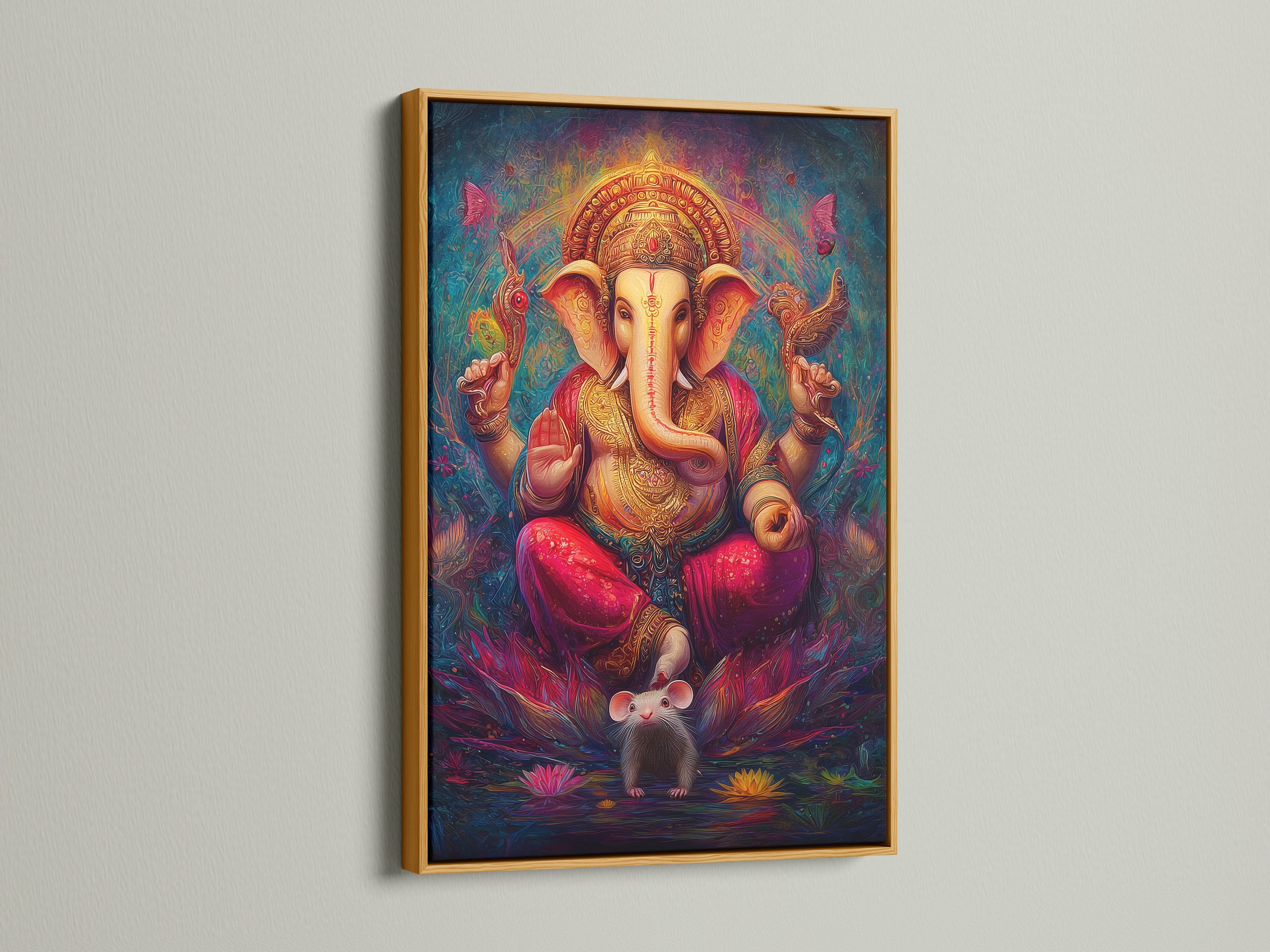 Ganesha Canvas Print in a gold frame. This Hindu God canvas provides spiritual wall decor. It's bohemian art that enhances a meditation room. This sacred artwork features an elephant god print. The colorful spiritual art enriches any space.