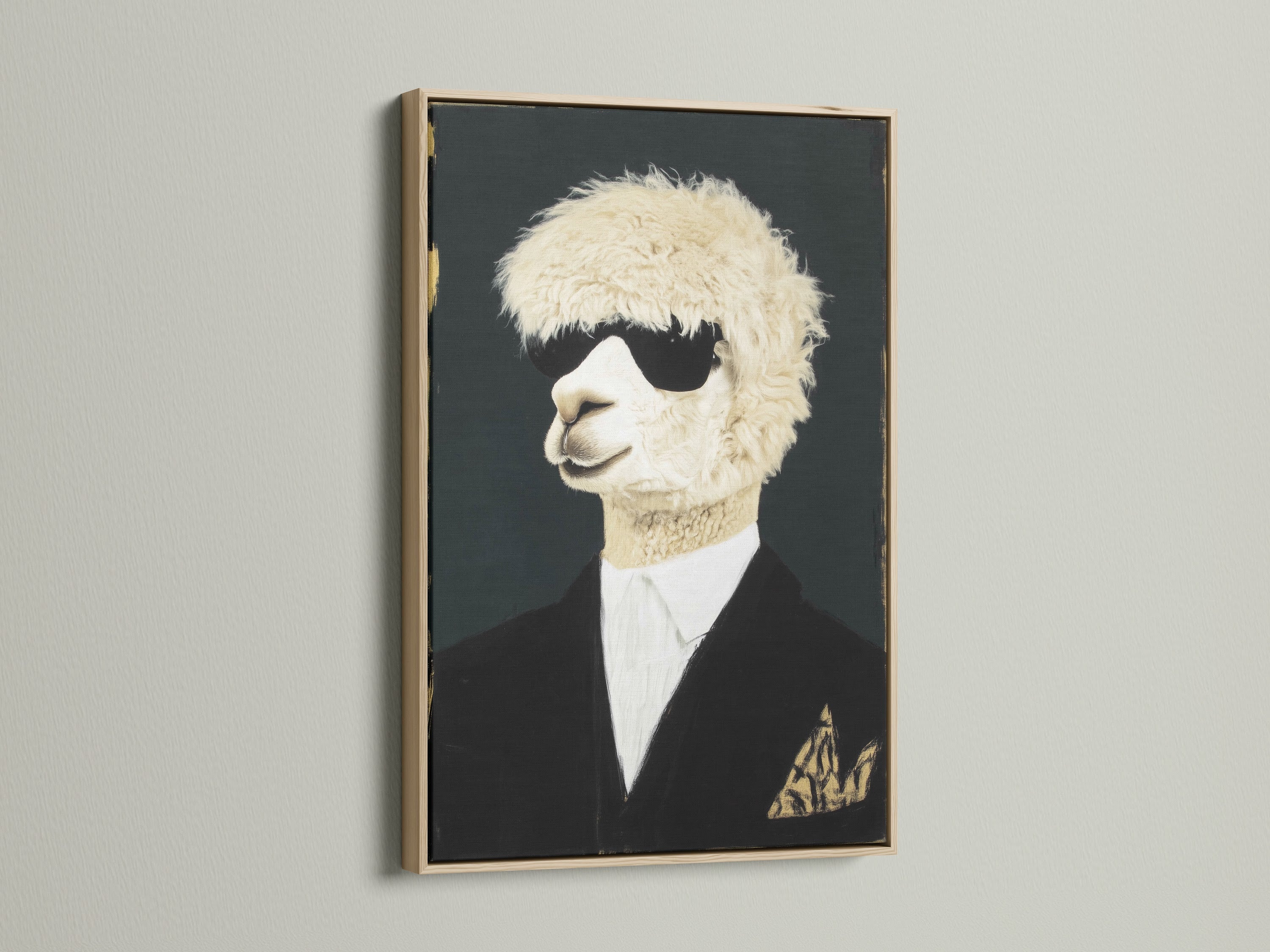 Cool Llama Art Print in an oak frame hangs on a white wall. This quirky animal wall art features a llama wearing sunglasses and a suit. The oak frame complements the modern animal art. Perfect formal portrait canvas print for office wall decor.