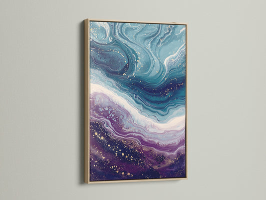 Abstract Ocean Wave canvas print in an oak frame. This piece combines teal and purple fluid artwork. It is a contemporary coastal wall art. The artwork is perfect for adding a modern touch to bedroom decor. Bring the calming essence of ocean waves into your home with this unique print