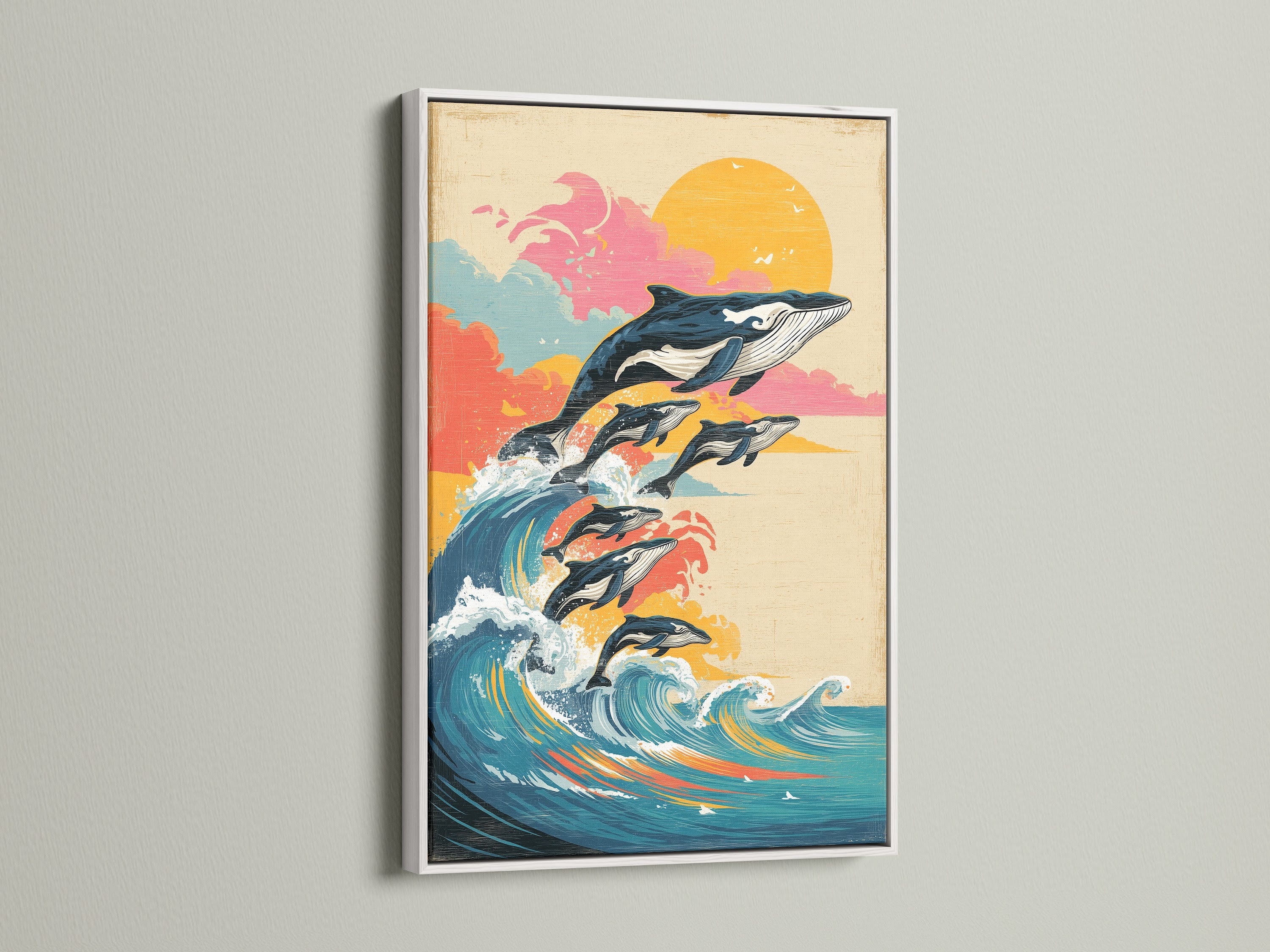 White frame displaying whale ocean artwork. This vintage marine artwork displays a sunset wave canvas print. Ideal for coastal wall decor. This artwork brings a fresh and clean aesthetic to your space. Discover marine life artwork and nautical wall art.