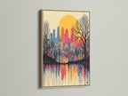 An oak frame highlights this City Skyline Canvas Print. The urban wall art captures a sunset scene with a unique drip paint effect. This colorful wall decor brings a modern cityscape indoors. A great addition to any space.
