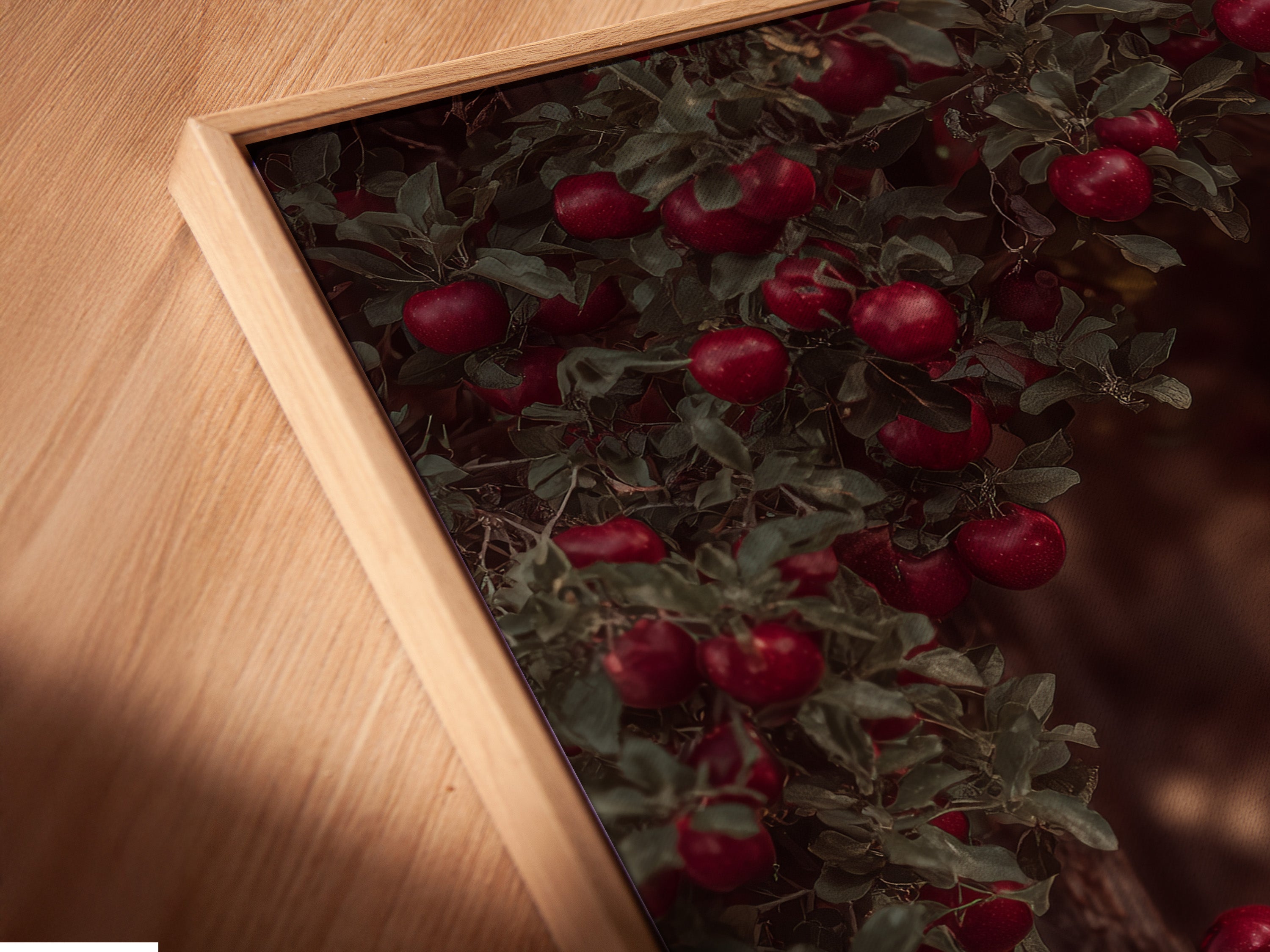 Close-up of the Apple Orchard canvas print in a floating frame. This unique framing style adds depth to the rustic farmhouse wall art. The floating frame highlights the vintage harvest decor beautifully.