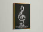 A gold frame surrounds this contemporary music artwork. The treble clef print features tiny figures. This adds a unique touch. The gold frame enhances the artwork's elegance. It's ideal for a music lover's collection. Perfect for music stores.