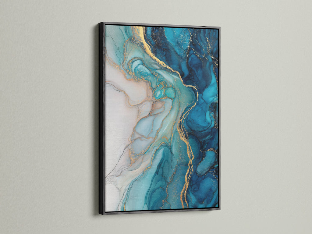 A black frame highlights the captivating blue abstract art. The fluid acrylic wall art showcases teal and gold marble details. This modern canvas art is ideal for any room. The artwork's contemporary style complements minimalist and eclectic interiors perfectly.